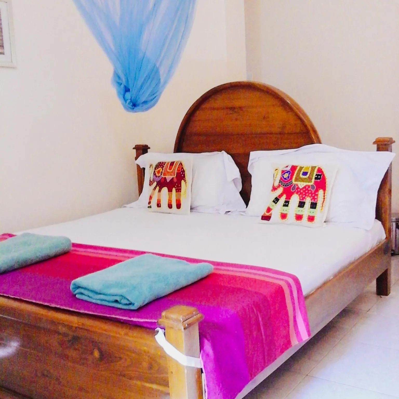 Bed in Suwani Pinnawala Homestay