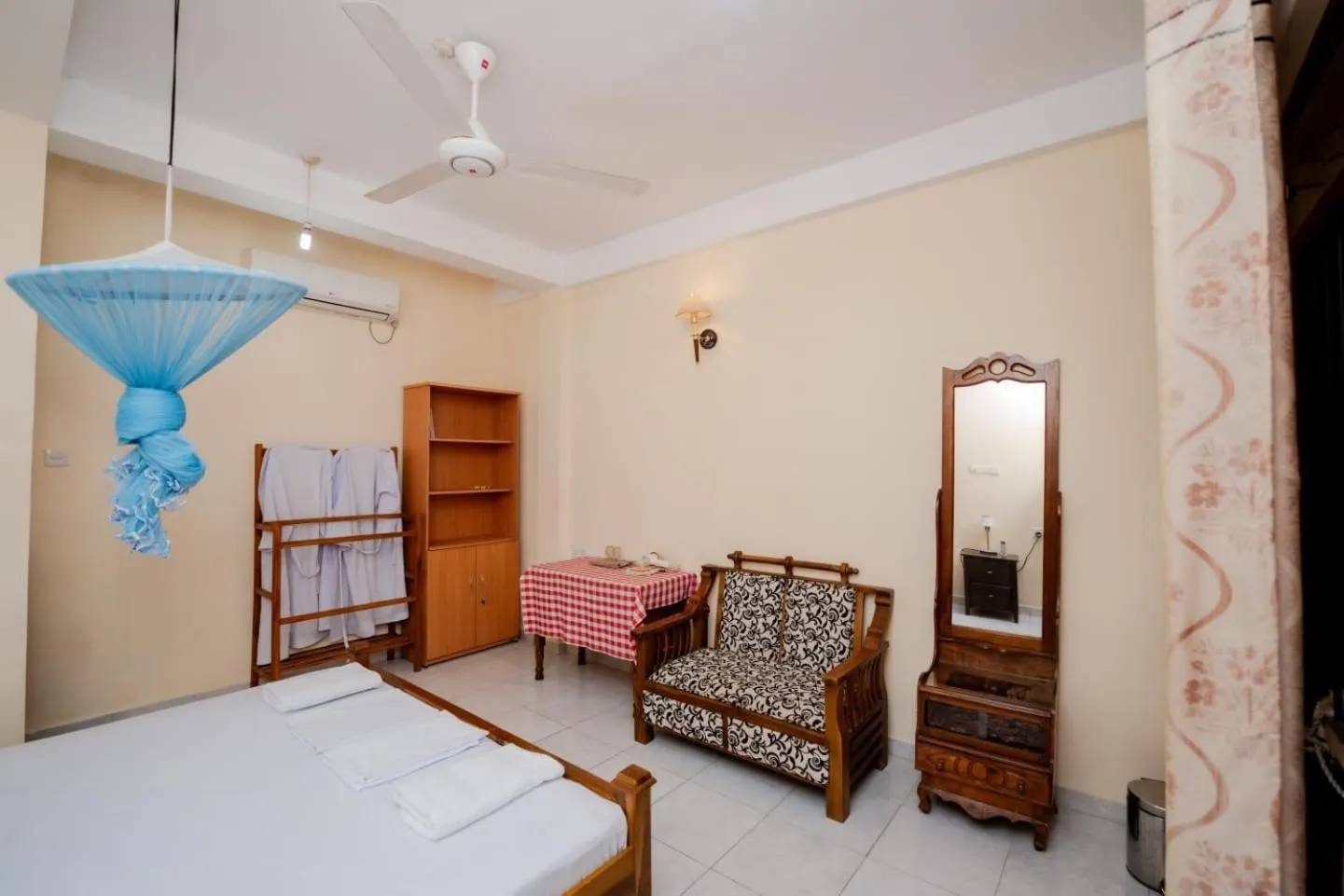 Bed in Suwani Pinnawala Homestay