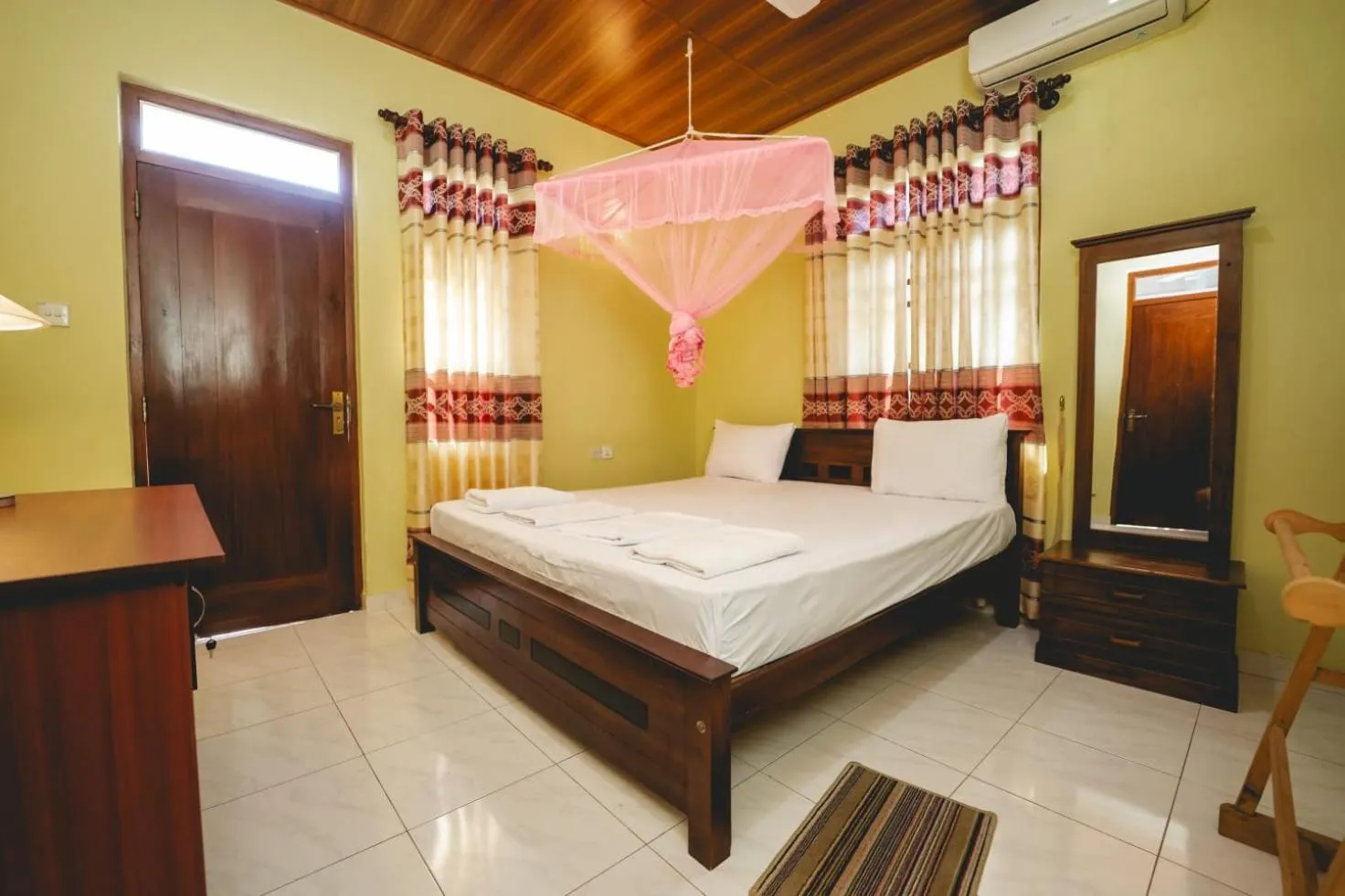 Bed in Suwani Pinnawala Homestay