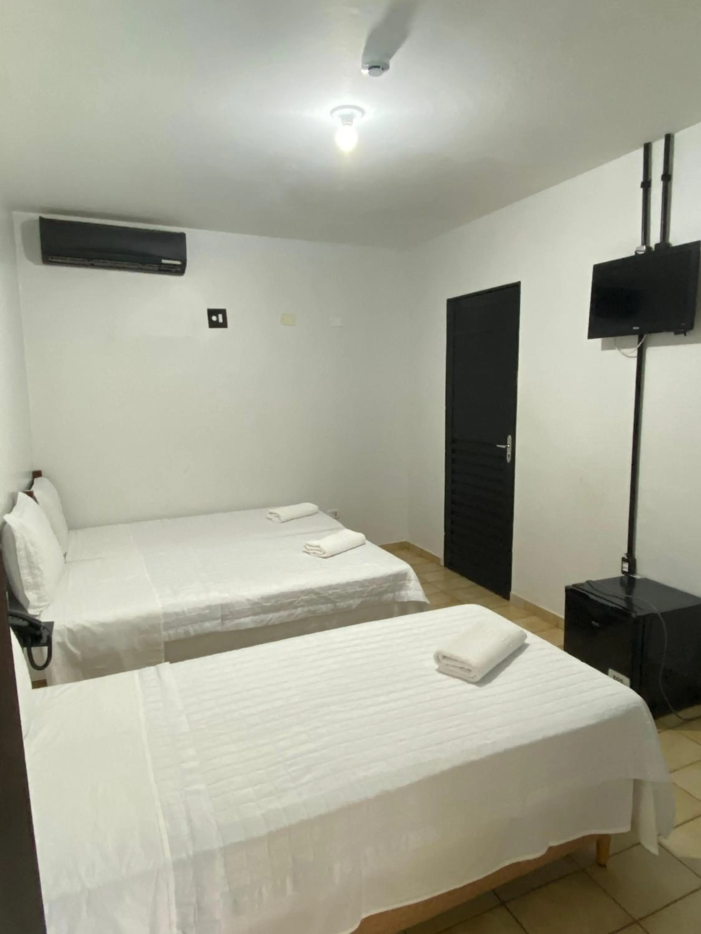 Bed in Pousada Aguas Quentes