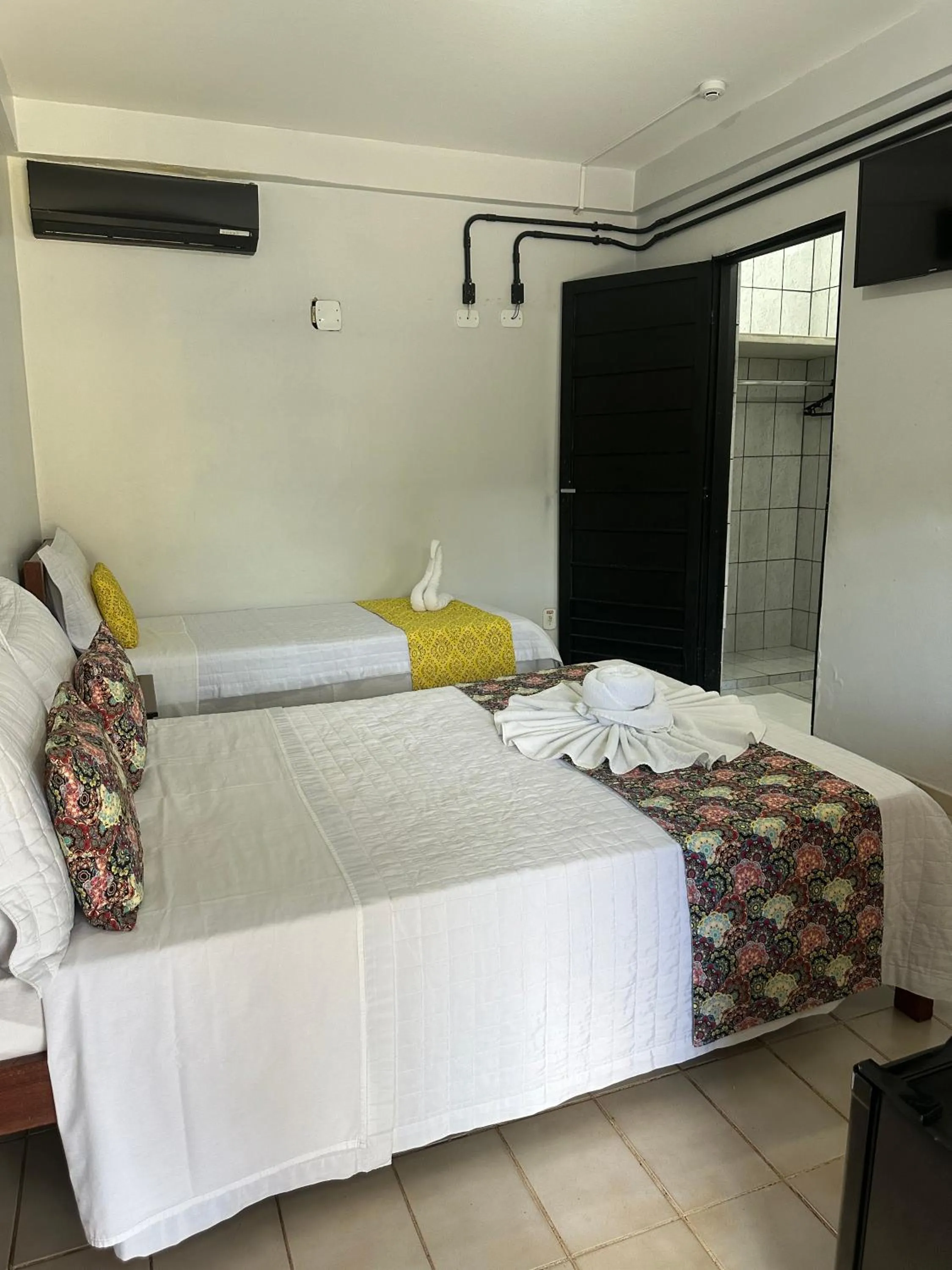 Bed in Pousada Aguas Quentes