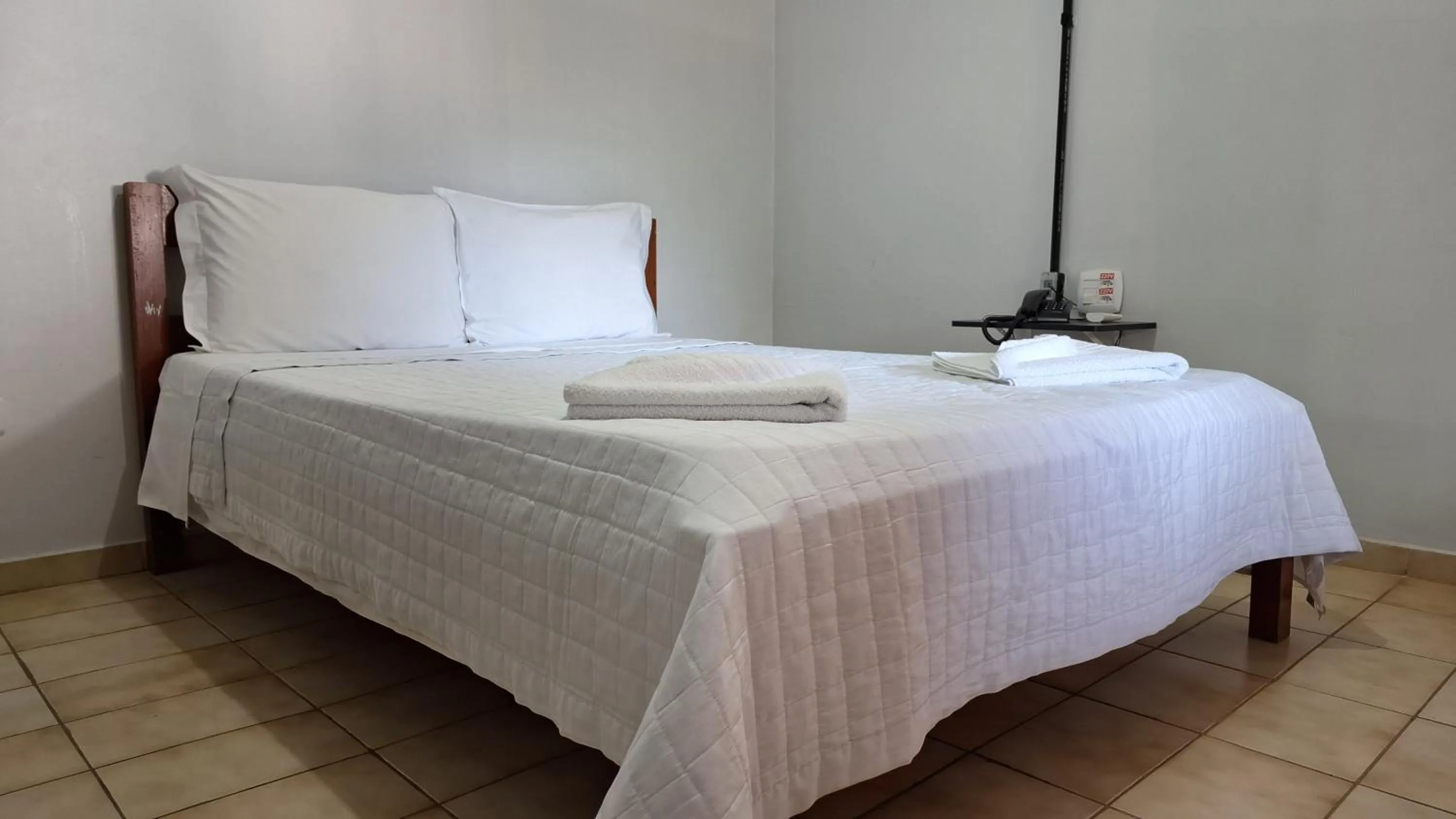 Bed in Pousada Aguas Quentes