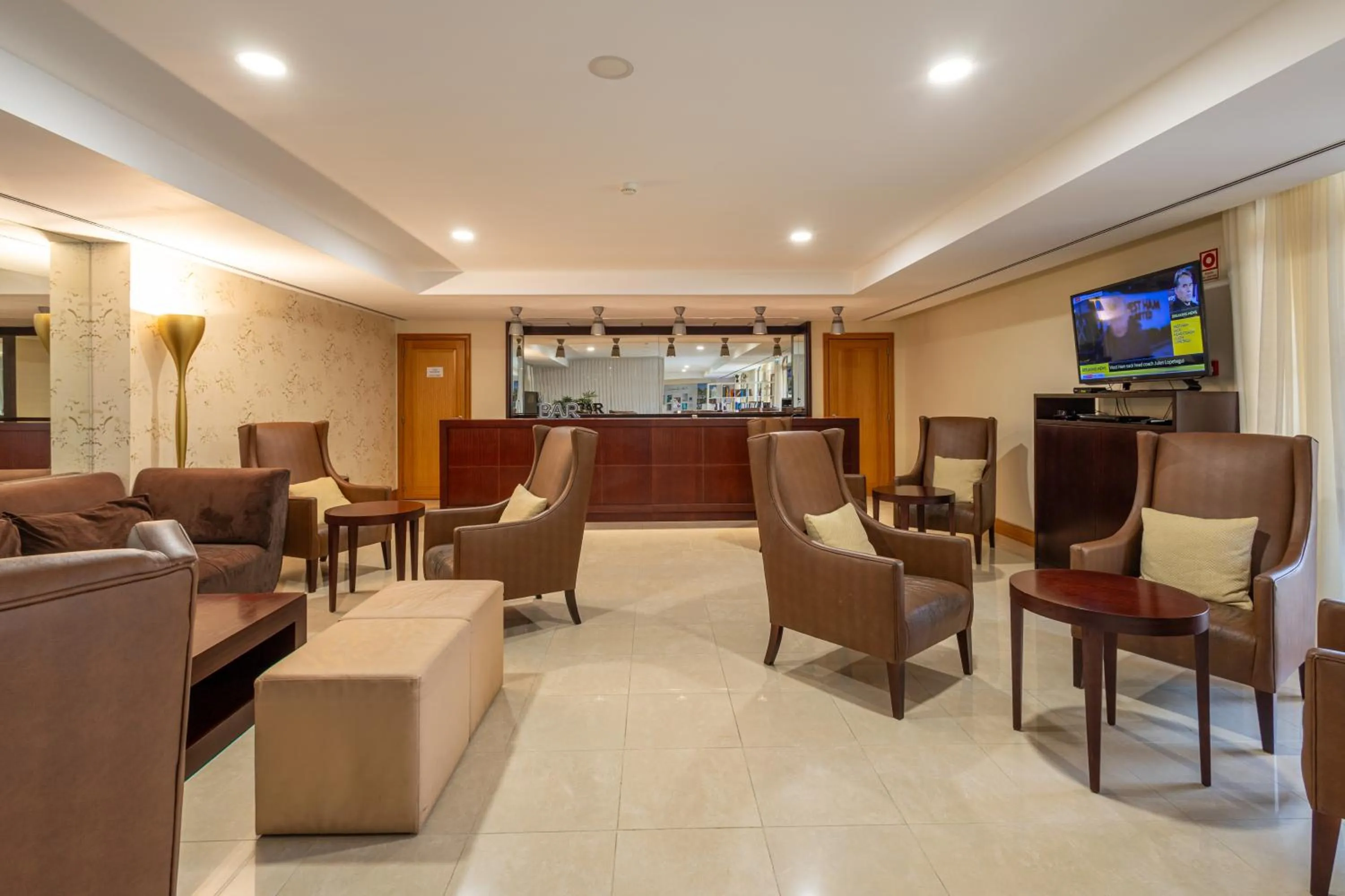 Communal lounge/ TV room in The Residences Vilamoura