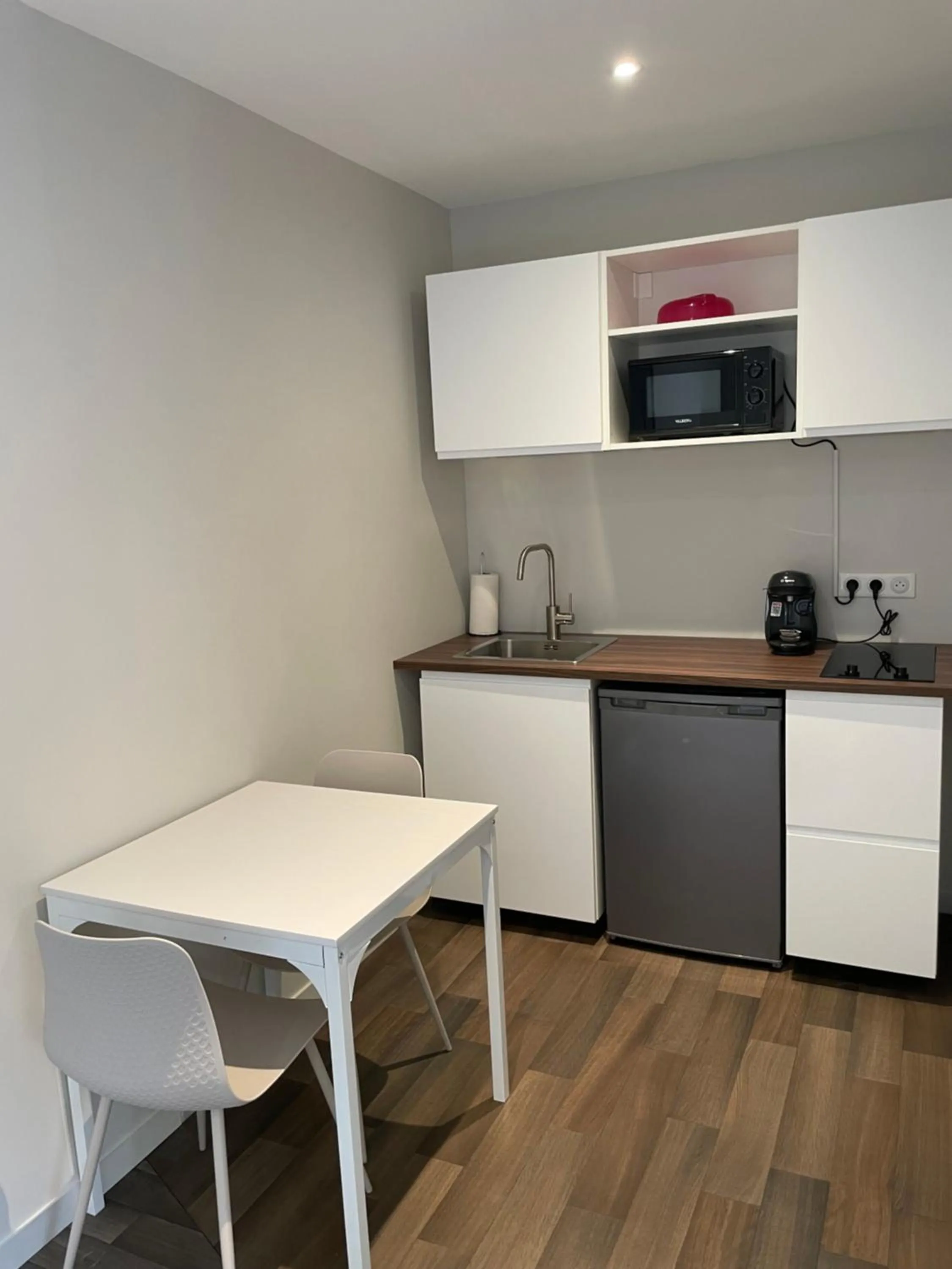 Kitchen or kitchenette in Ducey Appart'Hôtel - Les Rivières