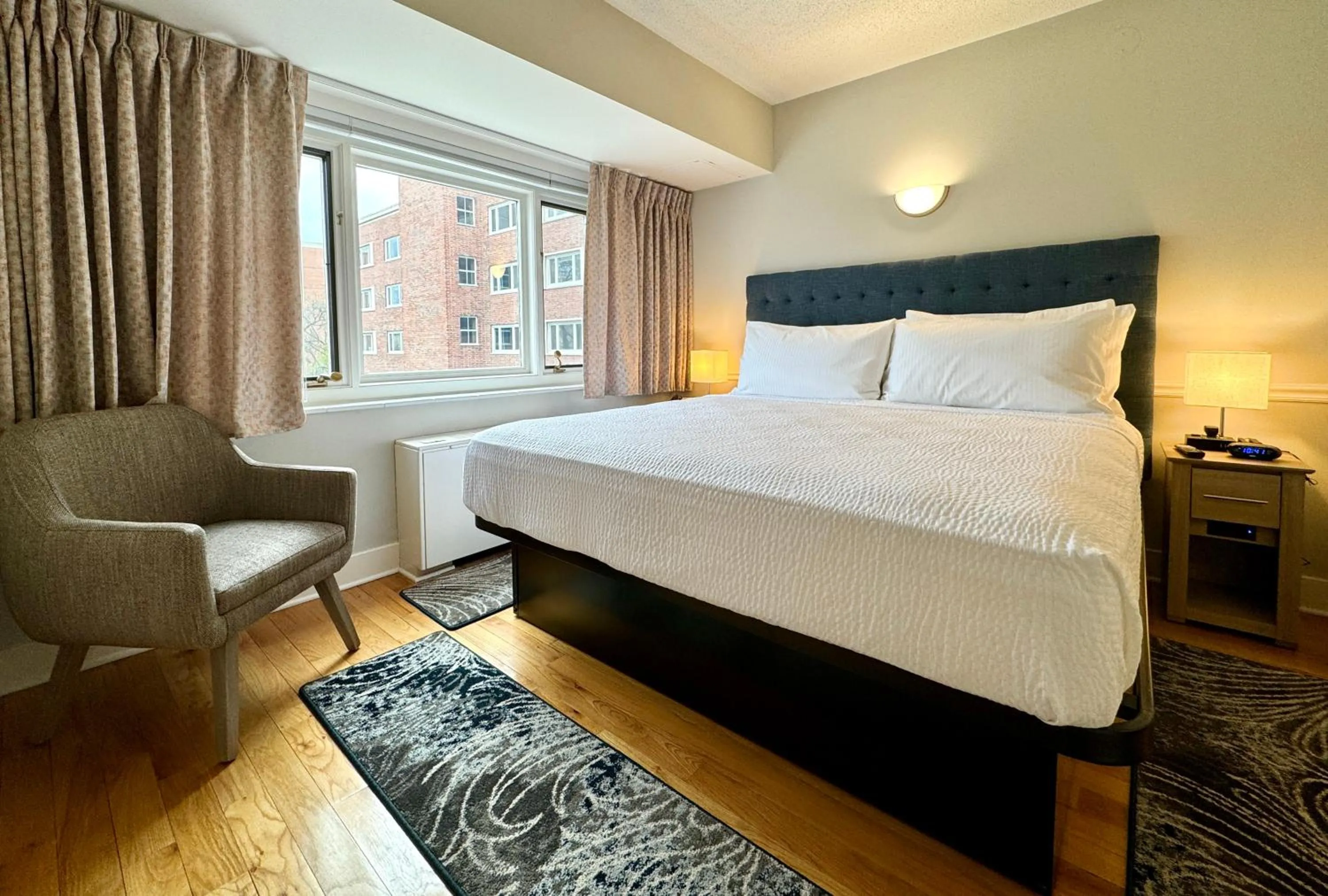 Bed in The GEM Museum Suites