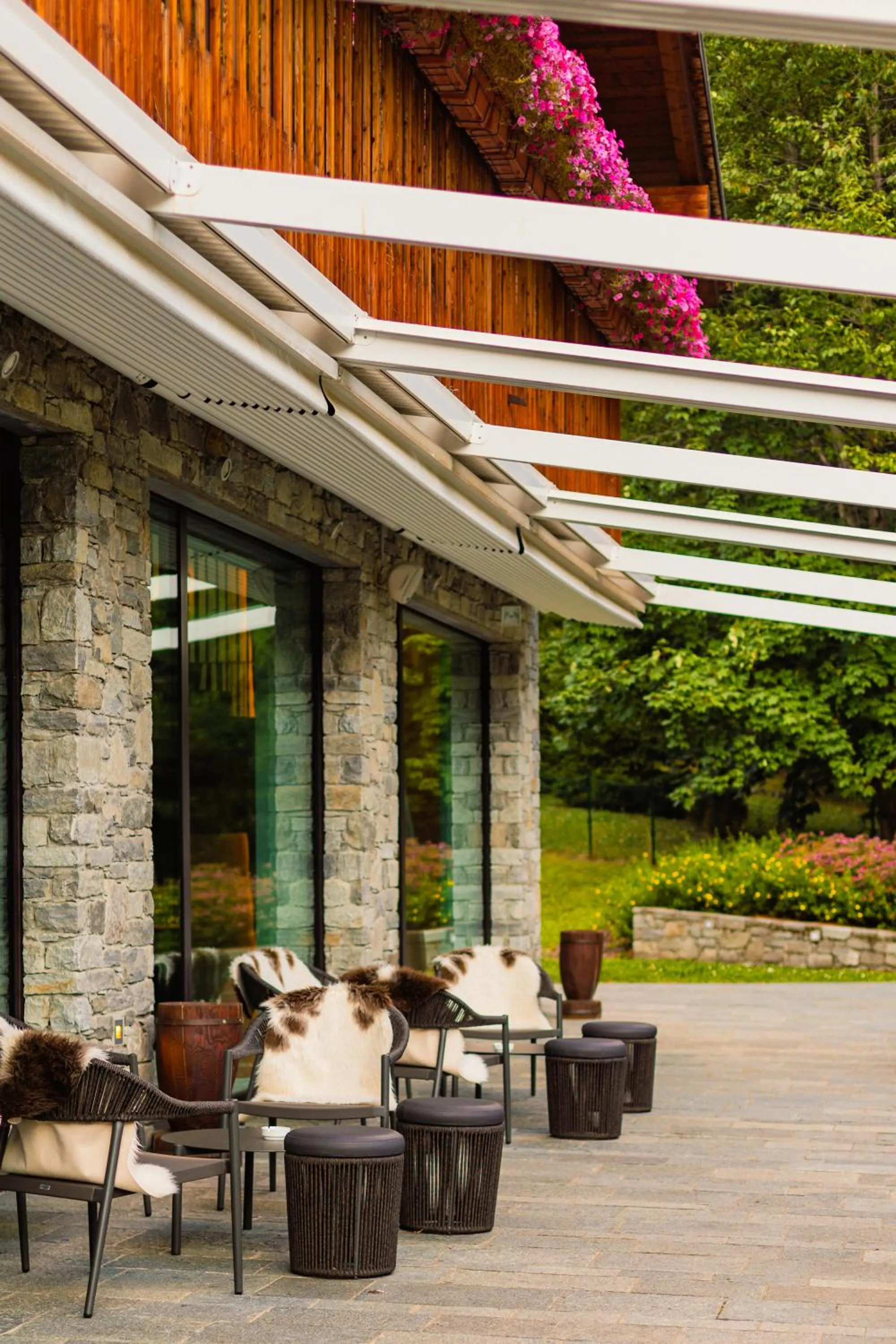 Patio in Grand Hotel Courmayeur Mont Blanc, by R Collection Hotels
