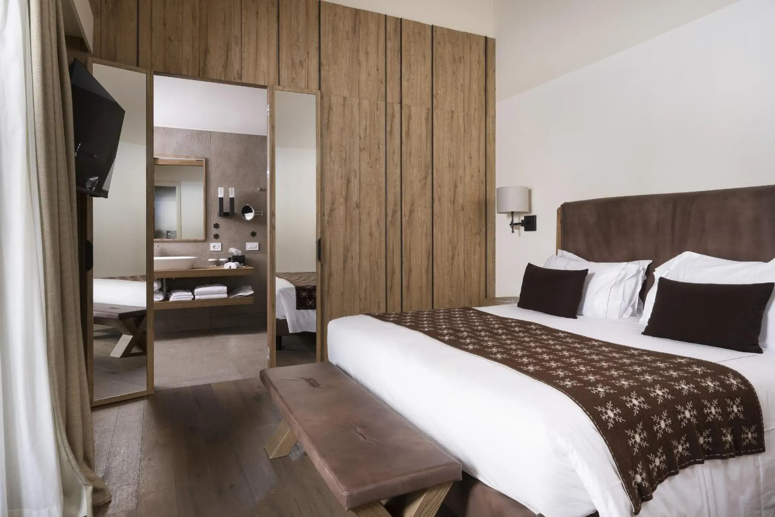 Bedroom, Bed in Grand Hotel Courmayeur Mont Blanc, by R Collection Hotels Bedroom, Bed in Grand Hotel Courmayeur Mont Blanc, by R Collection Hotels