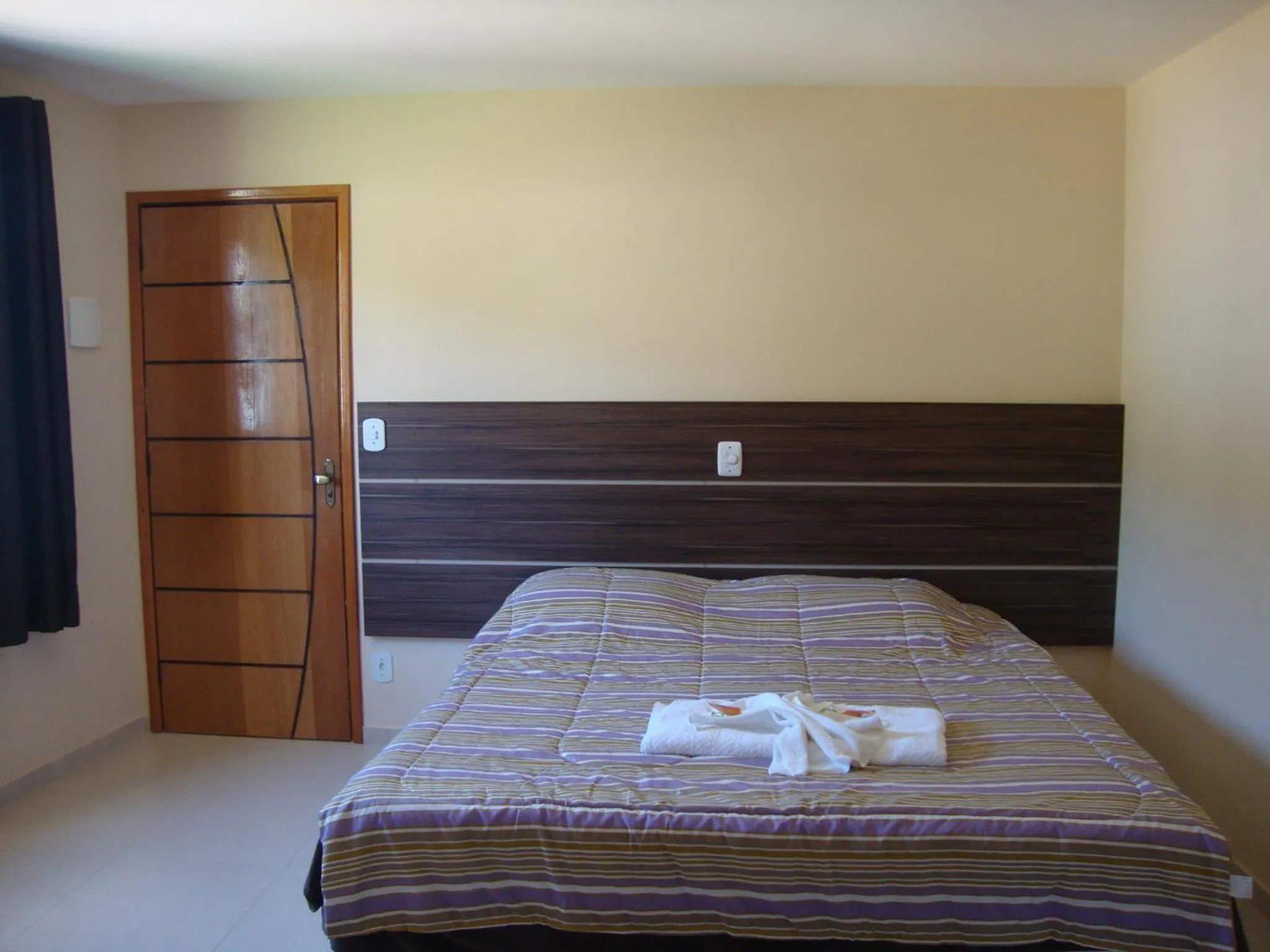Photo of the whole room, Bed in Pousada Circuito das Águas