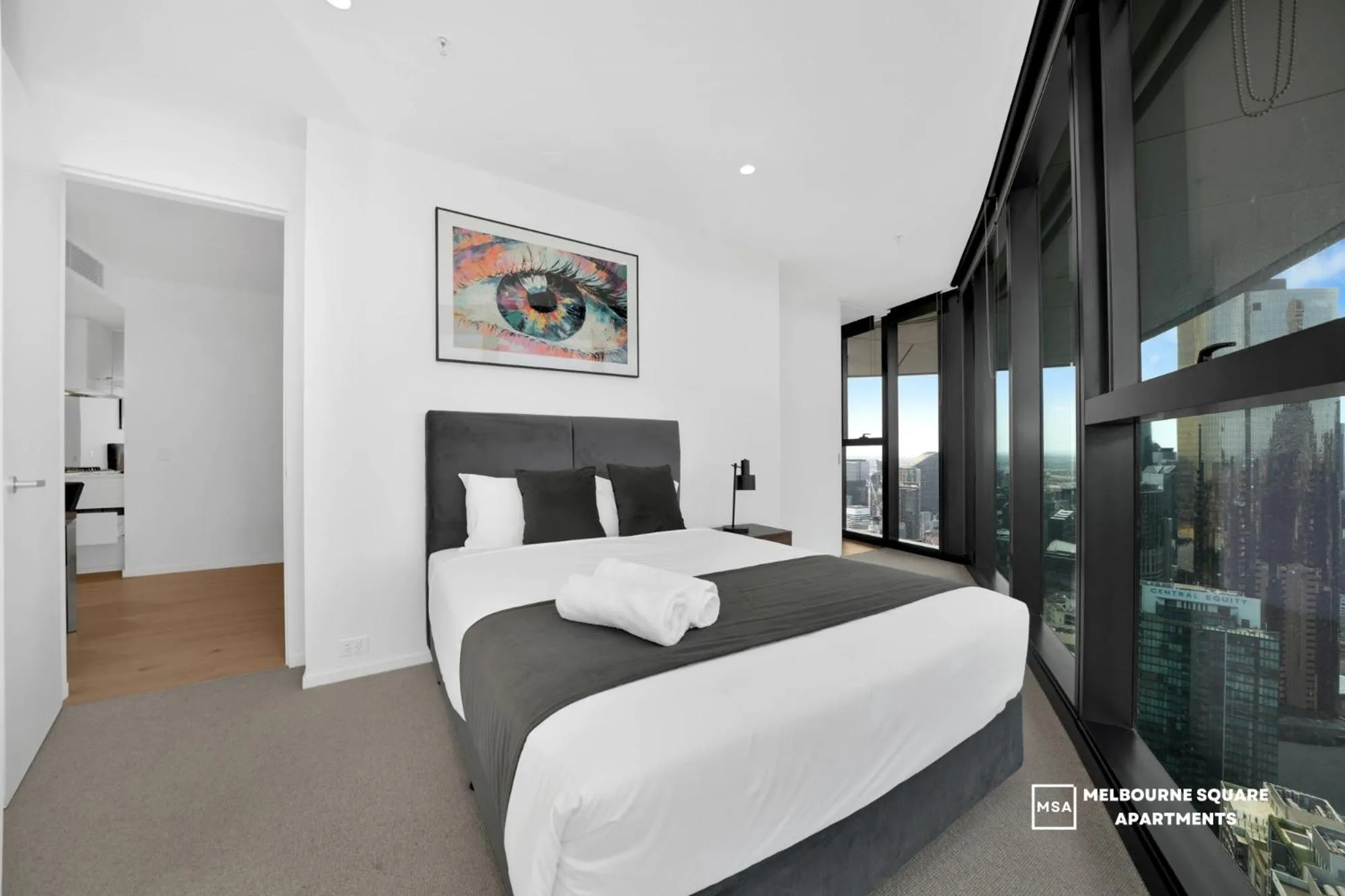 Photo of the whole room, Bed in Melbourne Square Apartments