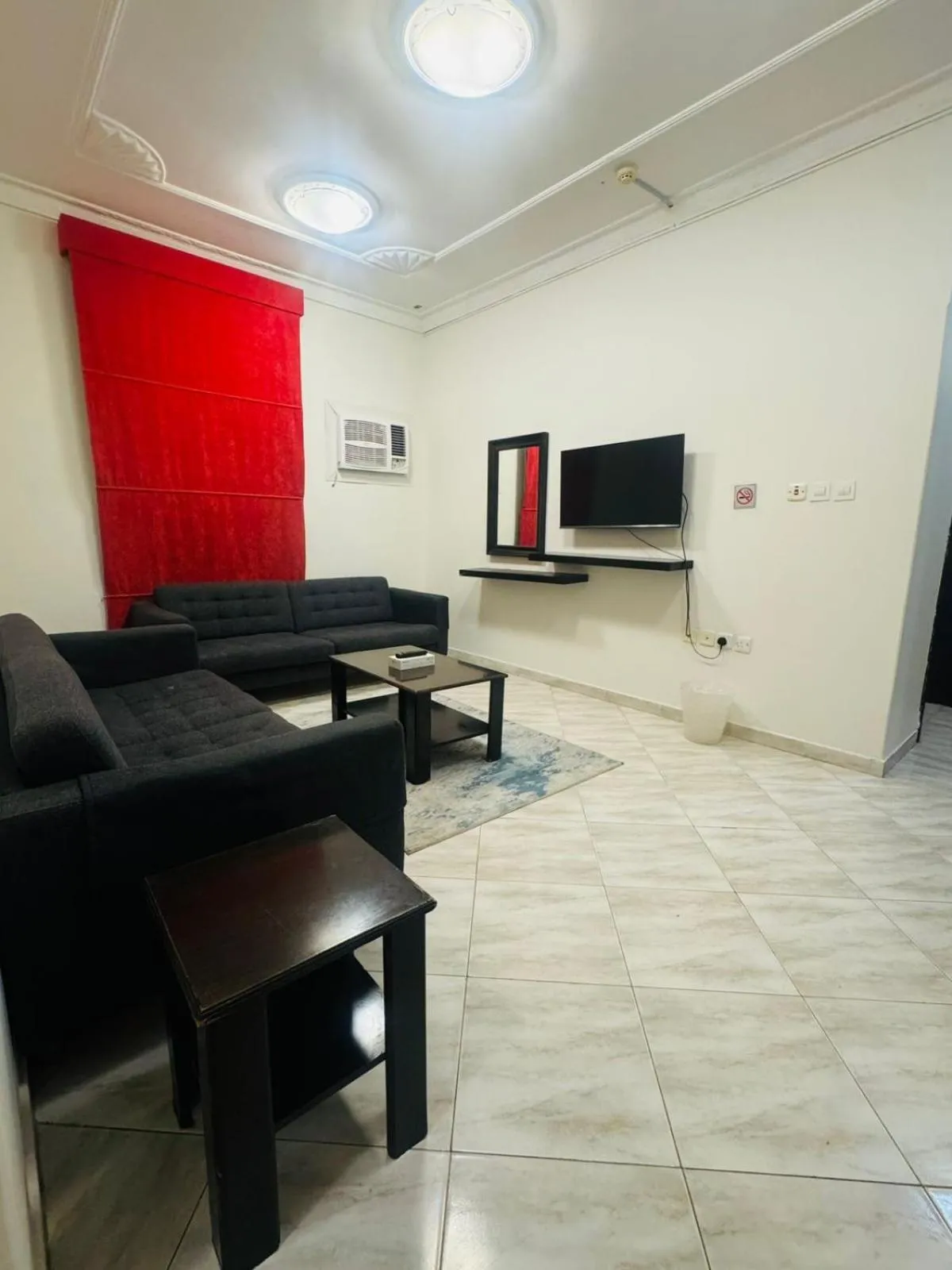 Communal lounge/ TV room in Lamas Furnished Units
