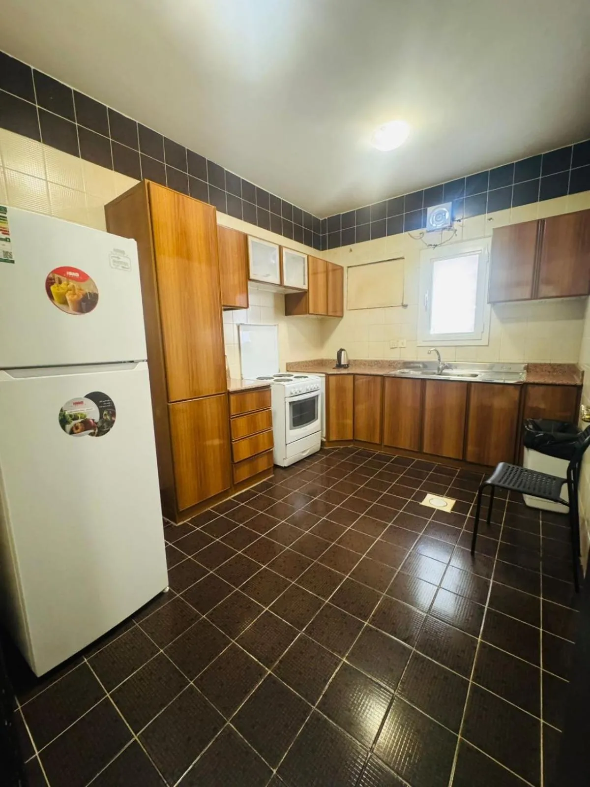 Kitchen or kitchenette in Lamas Furnished Units
