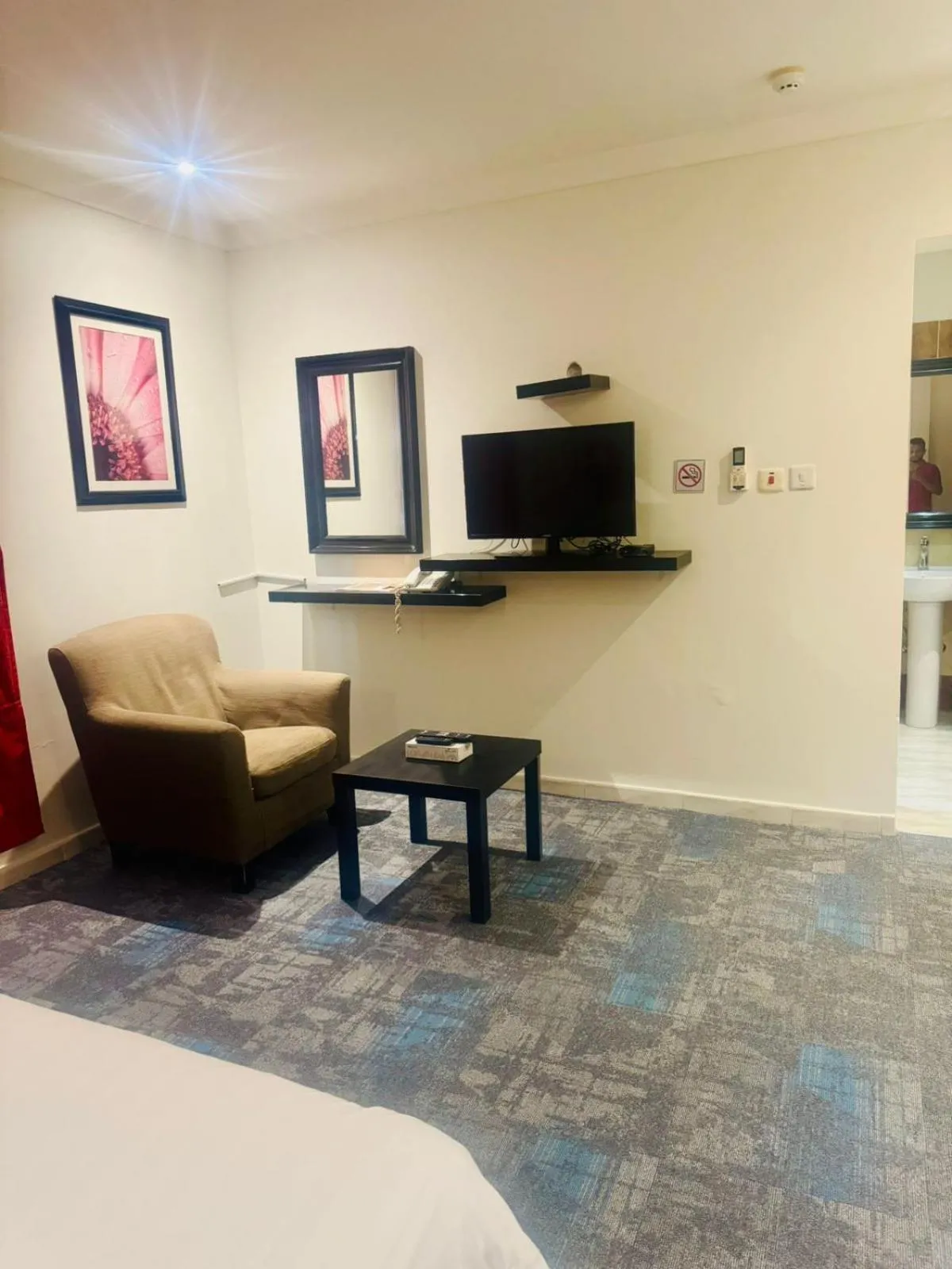Seating area, Bed in Lamas Furnished Units