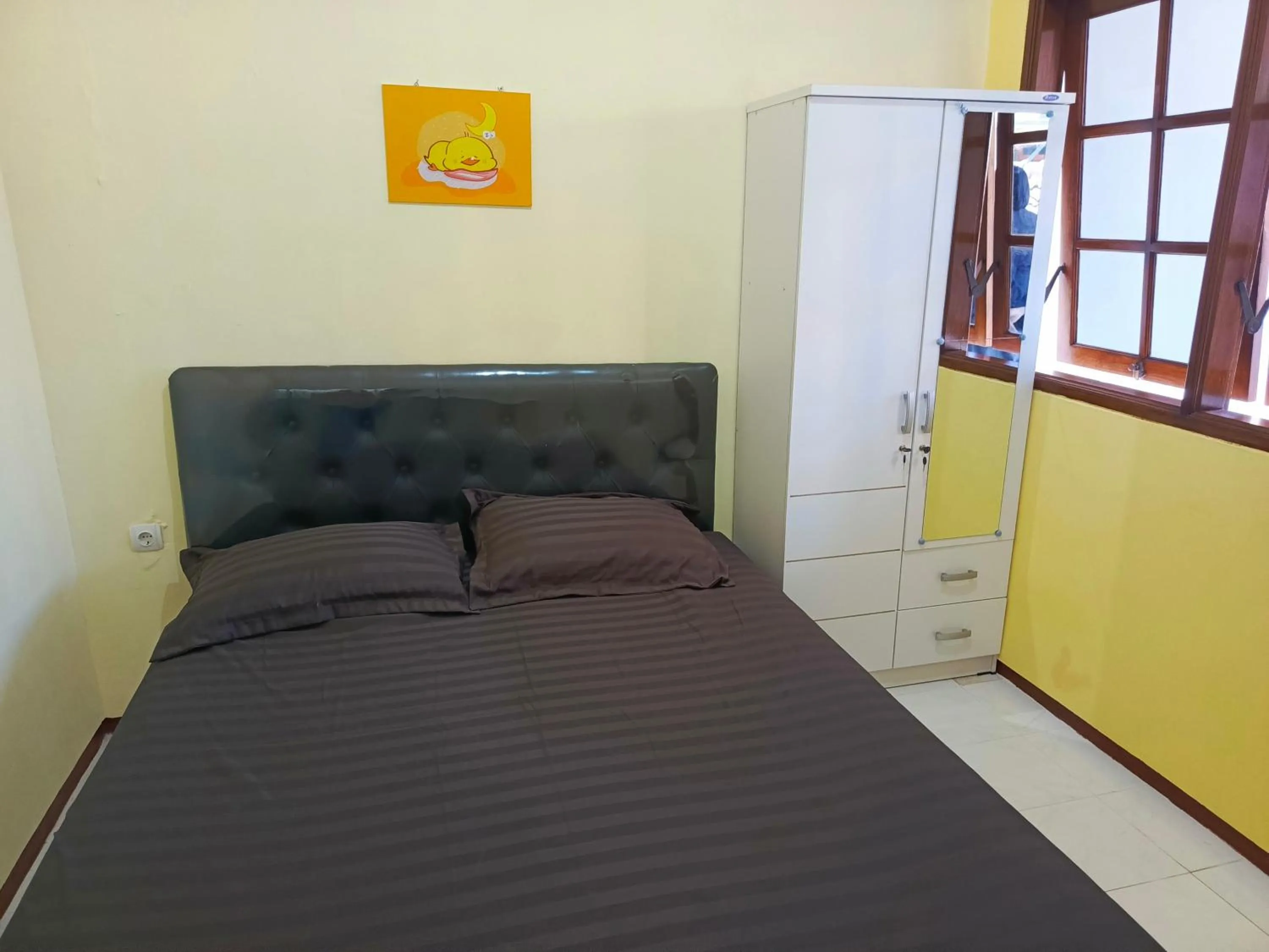 Bed in Bebek Kuning Residence