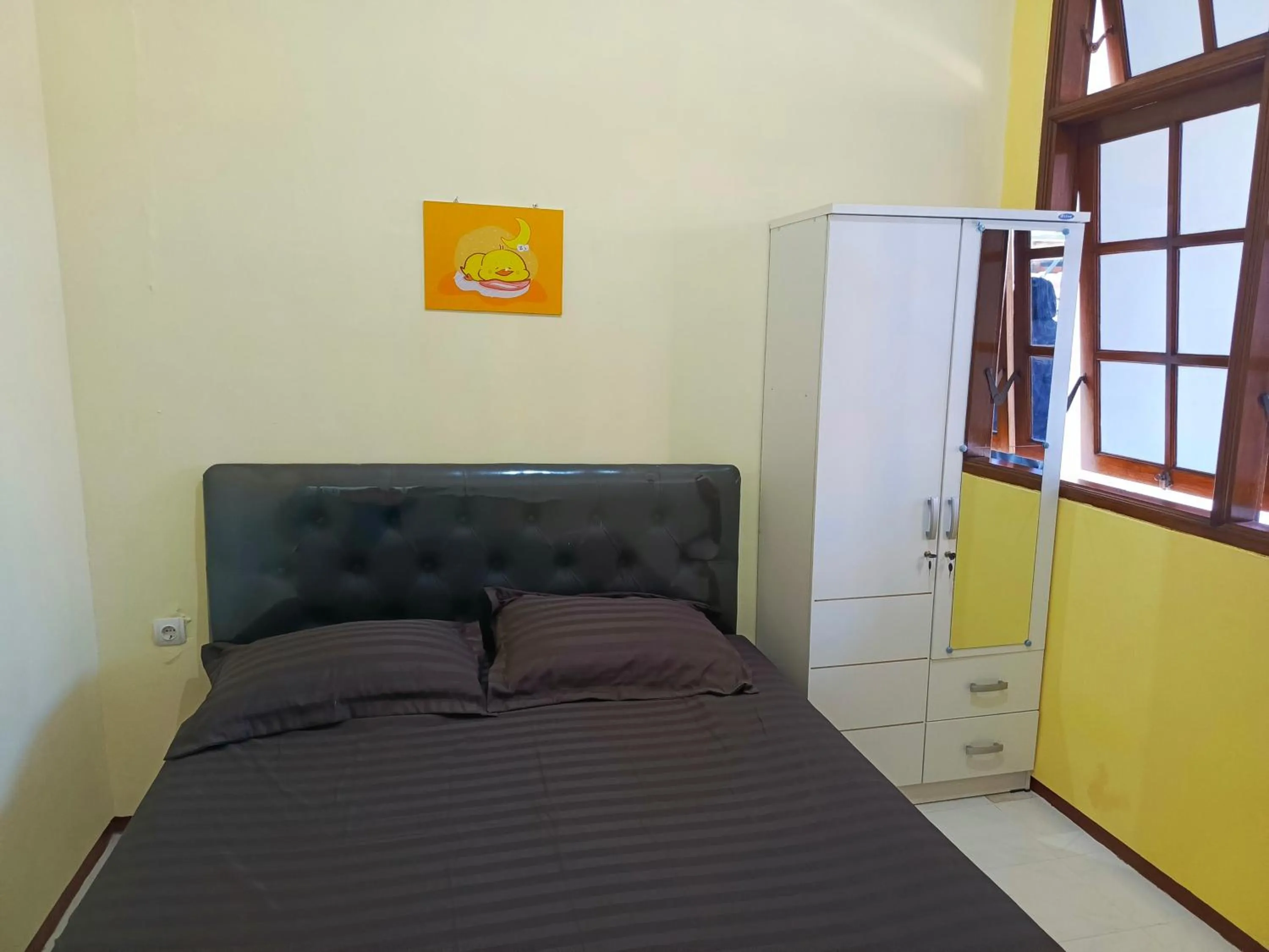 Bed in Bebek Kuning Residence