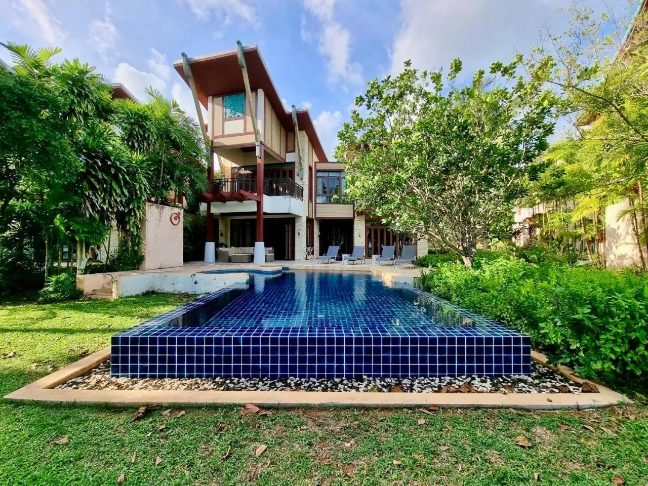 Swimming pool in Amatapura Beachfront Villa 12, SHA Certified