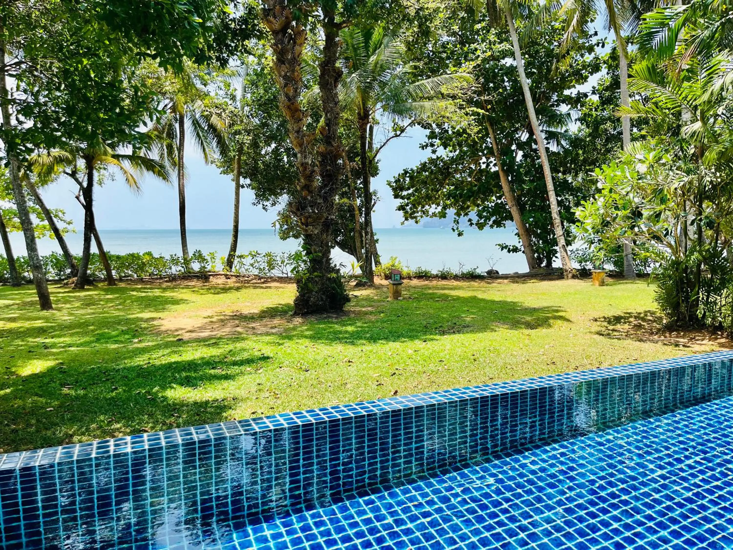 Swimming pool in Amatapura Beachfront Villa 14, SHA Certified