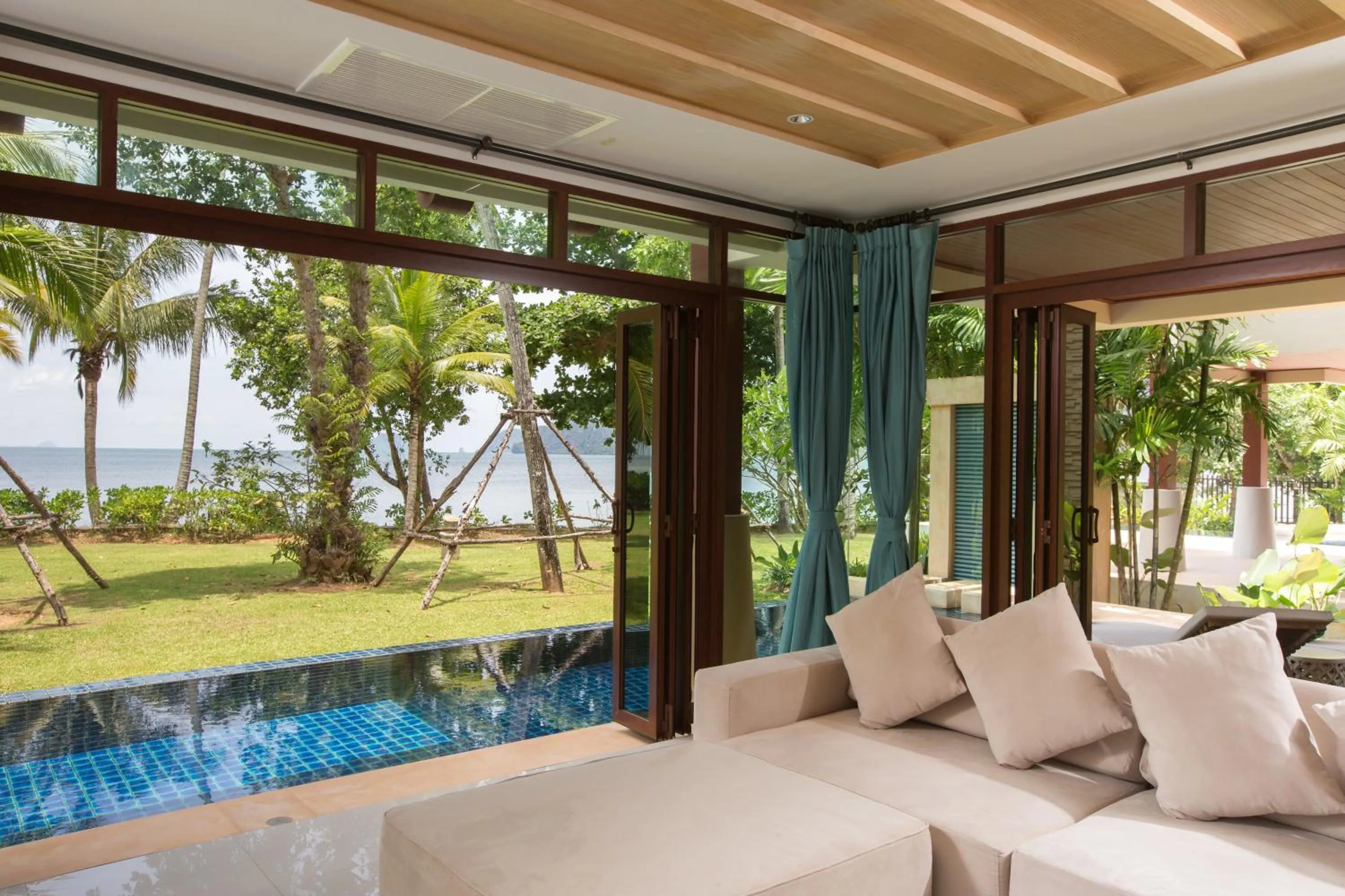 Swimming pool in Amatapura Beachfront Villa 14, SHA Certified