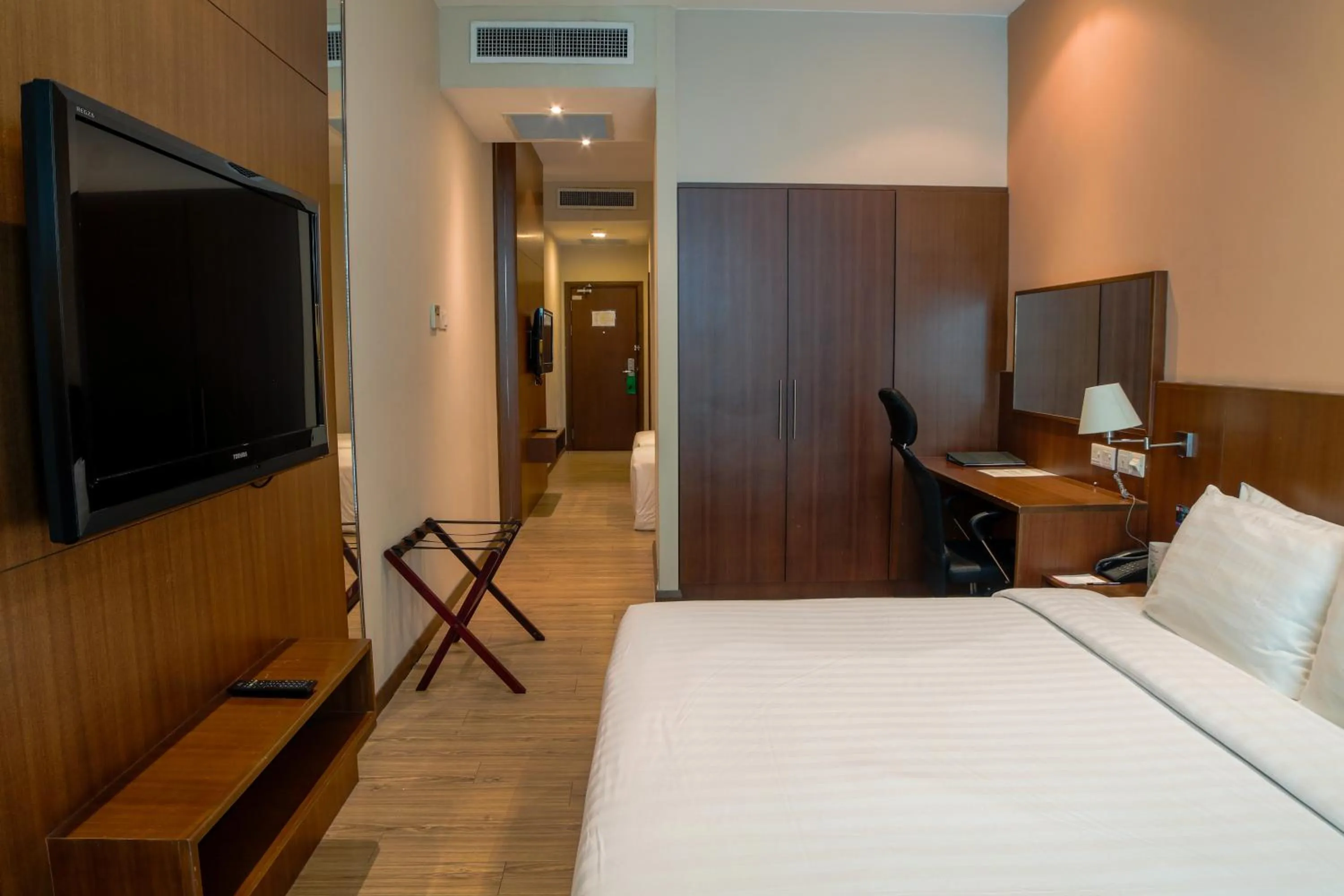 Photo of the whole room, Bed in Swiss Hotel Apartment