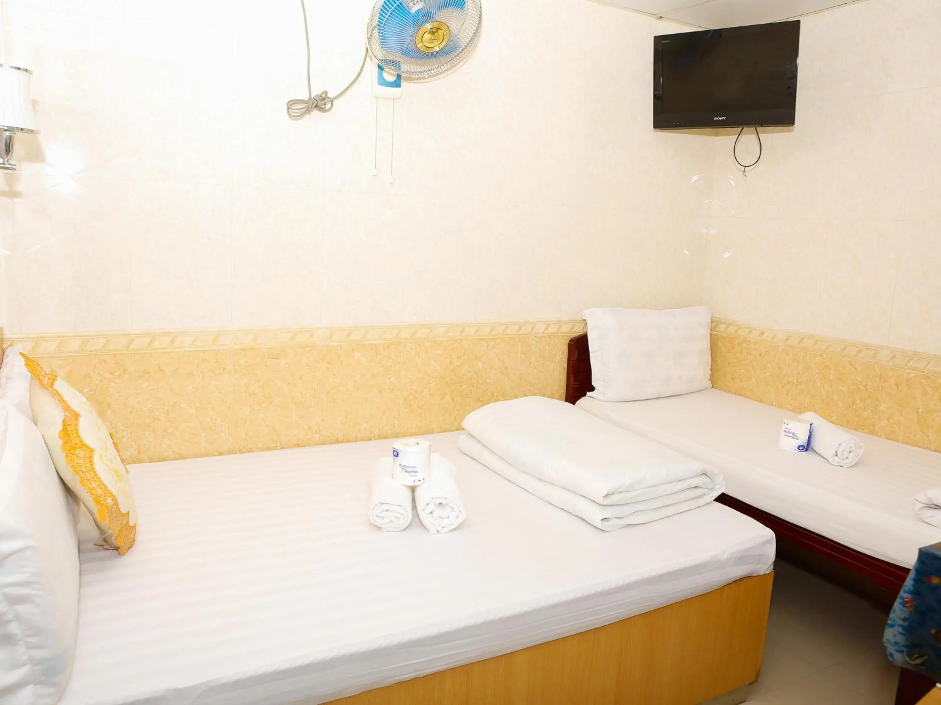 Bed in New Guangzhou Guest House Bed in New Guangzhou Guest House