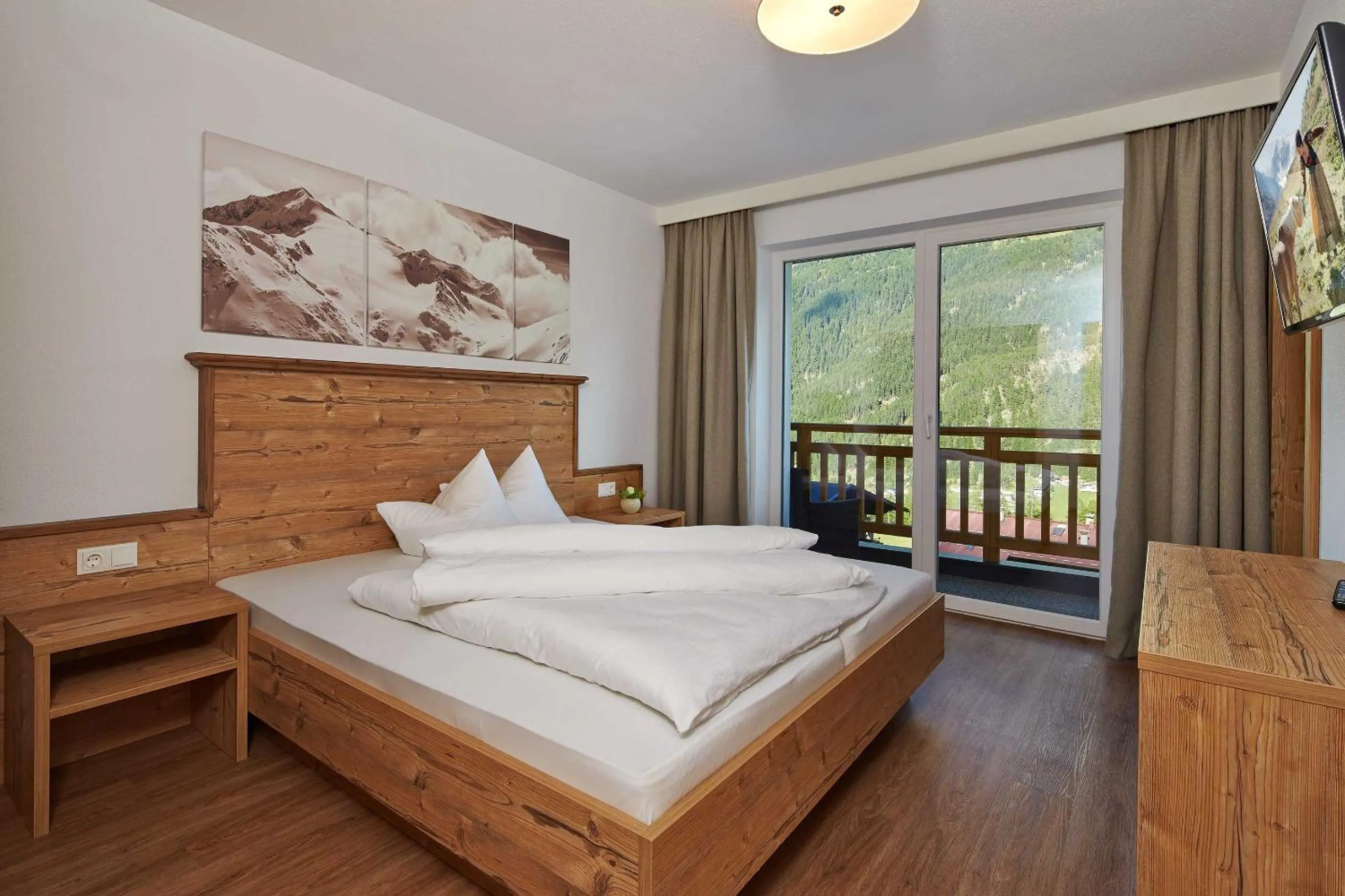Photo of the whole room, Bed in Alpendiamond Ski in & Bike Out apartments Top 200, 400 & penthouse 600