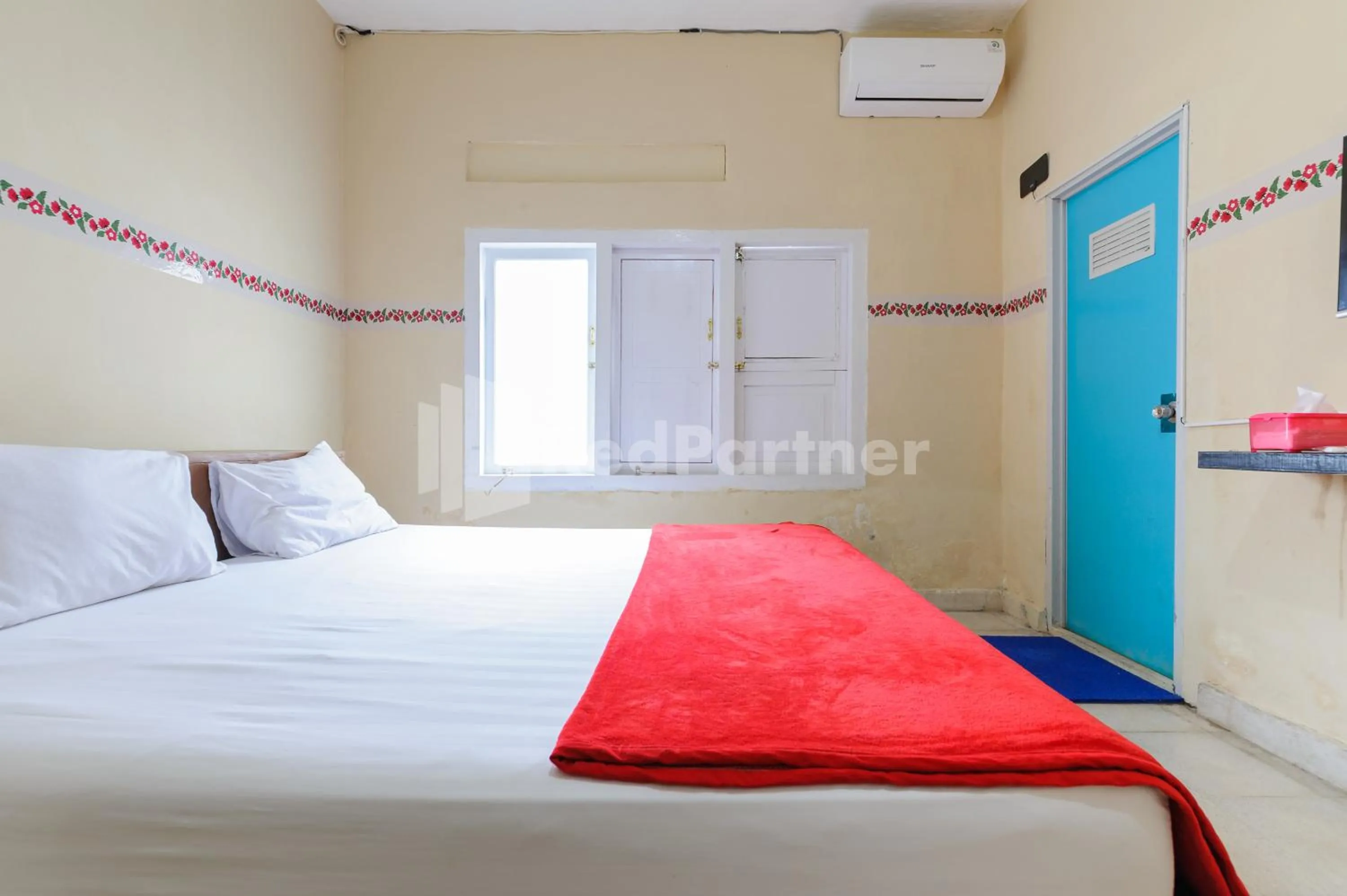 Bedroom, Bed in Arwana Inn Lampung Mitra RedDoorz