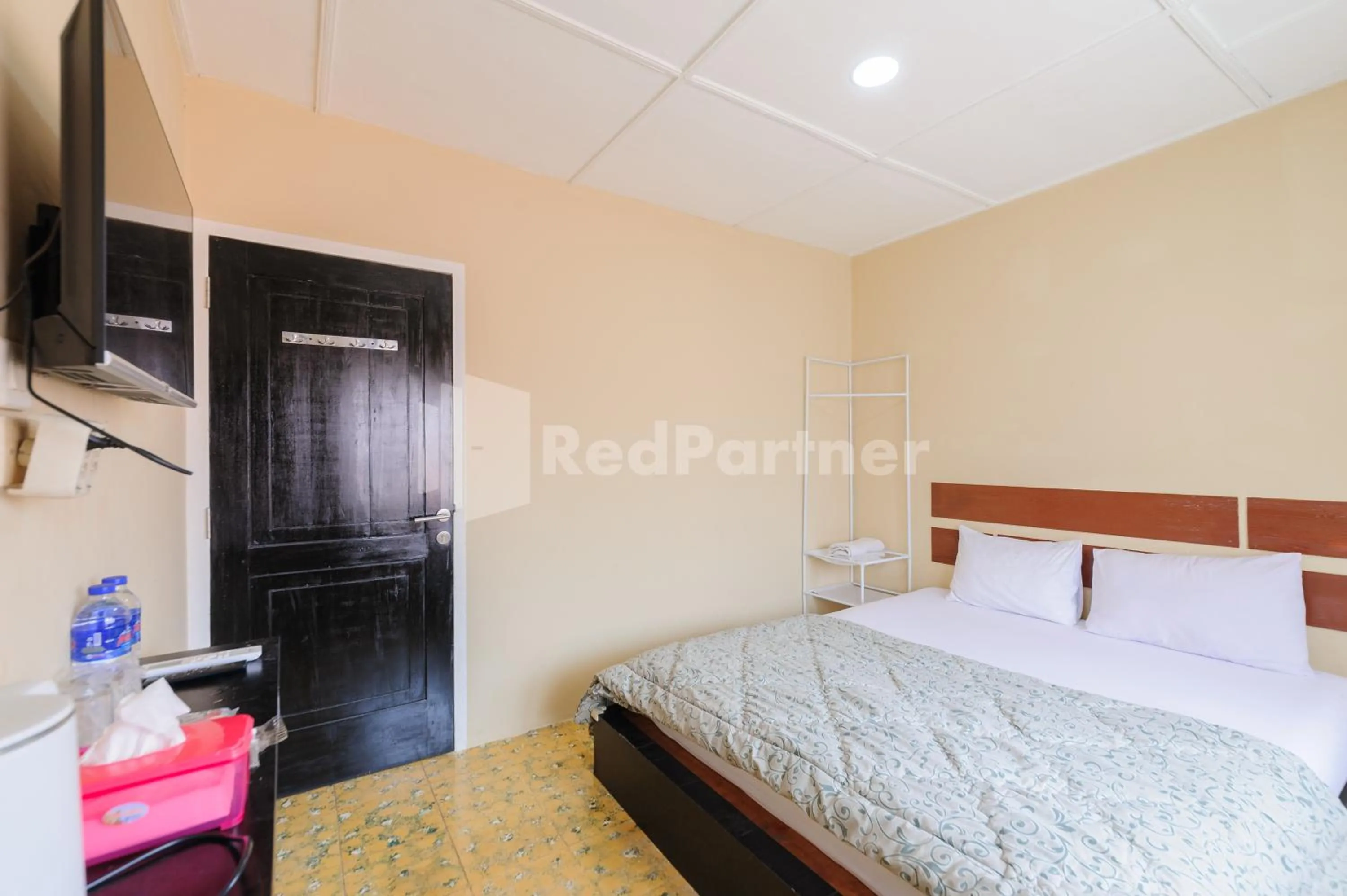 Bedroom, Bed in Arwana Inn Lampung Mitra RedDoorz