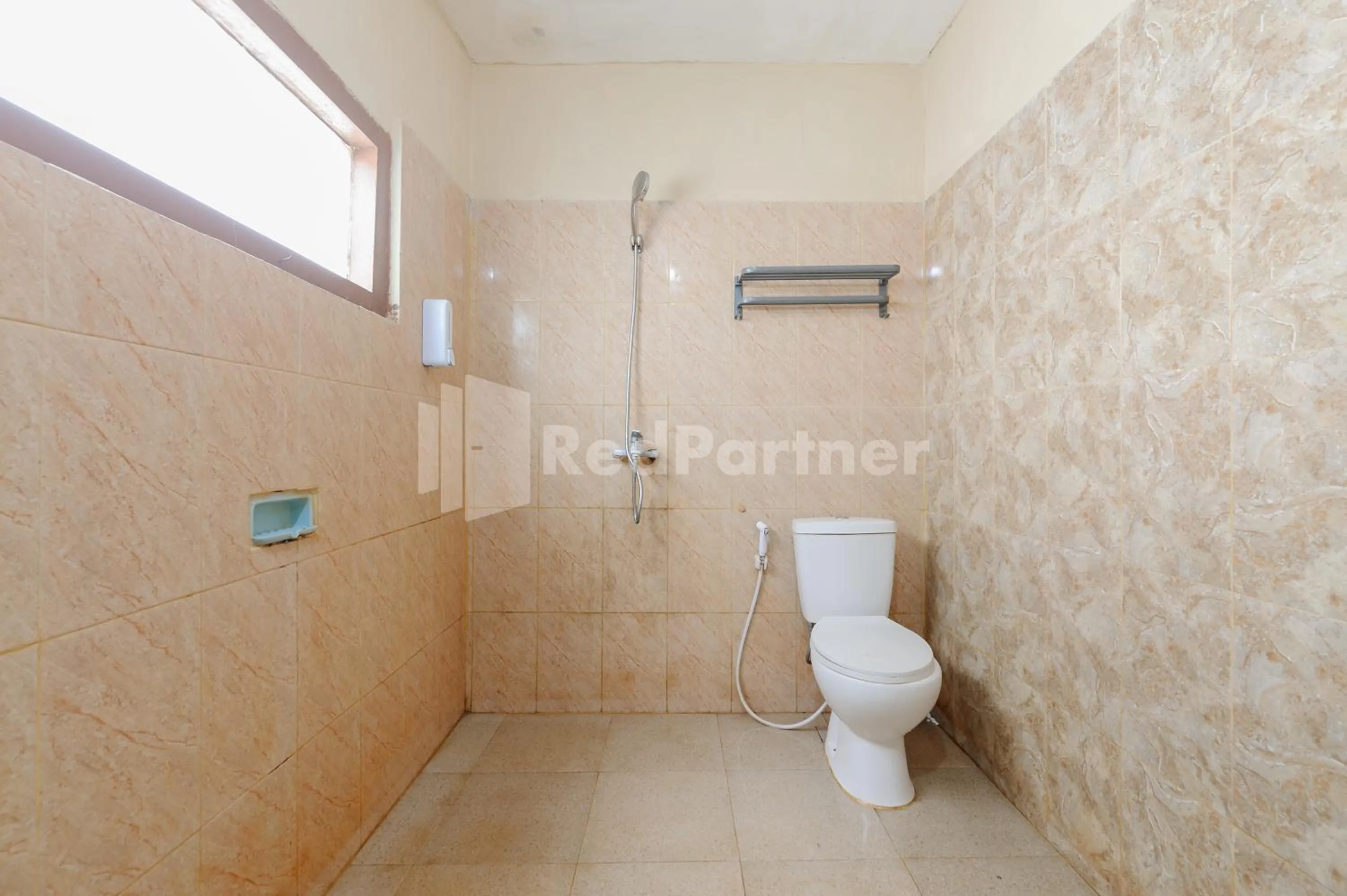 Bathroom in Arwana Inn Lampung Mitra RedDoorz