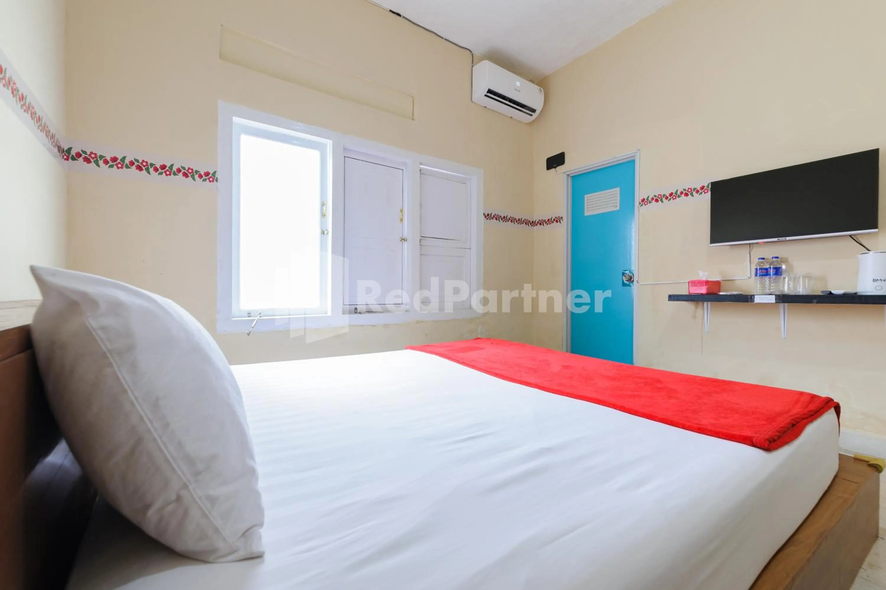 Bedroom, Bed in Arwana Inn Lampung Mitra RedDoorz
