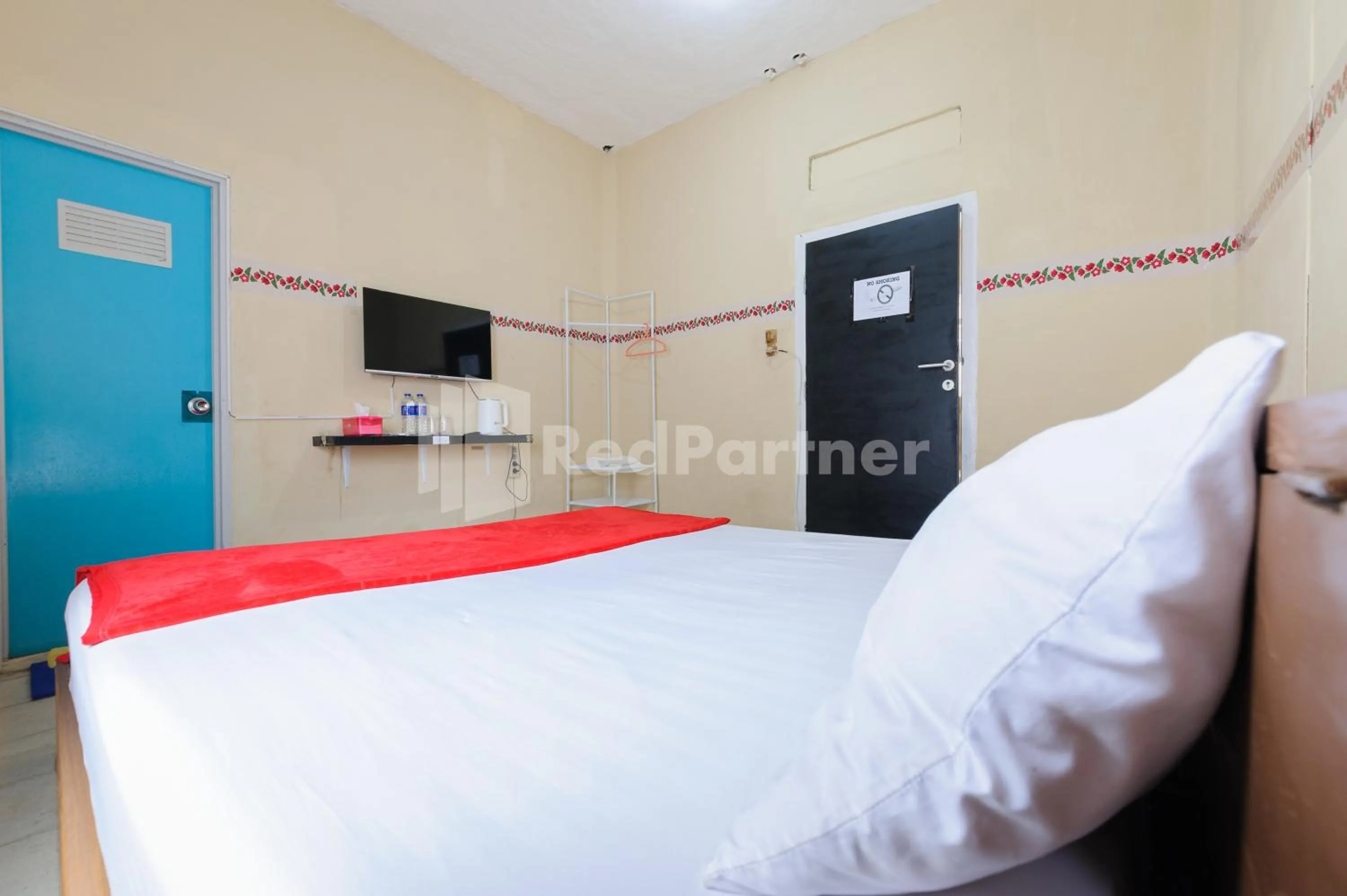 Bedroom, Bed in Arwana Inn Lampung Mitra RedDoorz