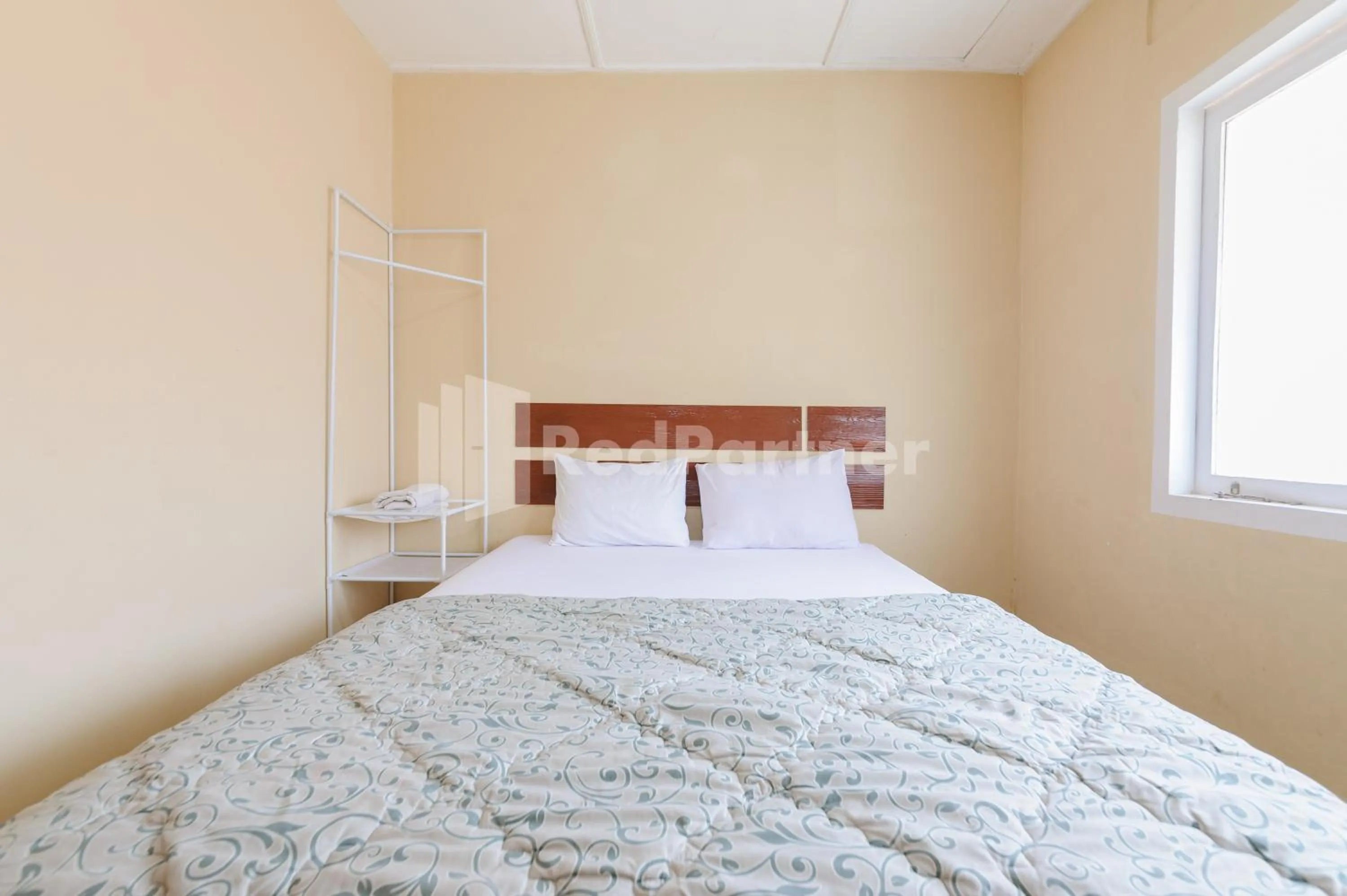 Bedroom, Bed in Arwana Inn Lampung Mitra RedDoorz