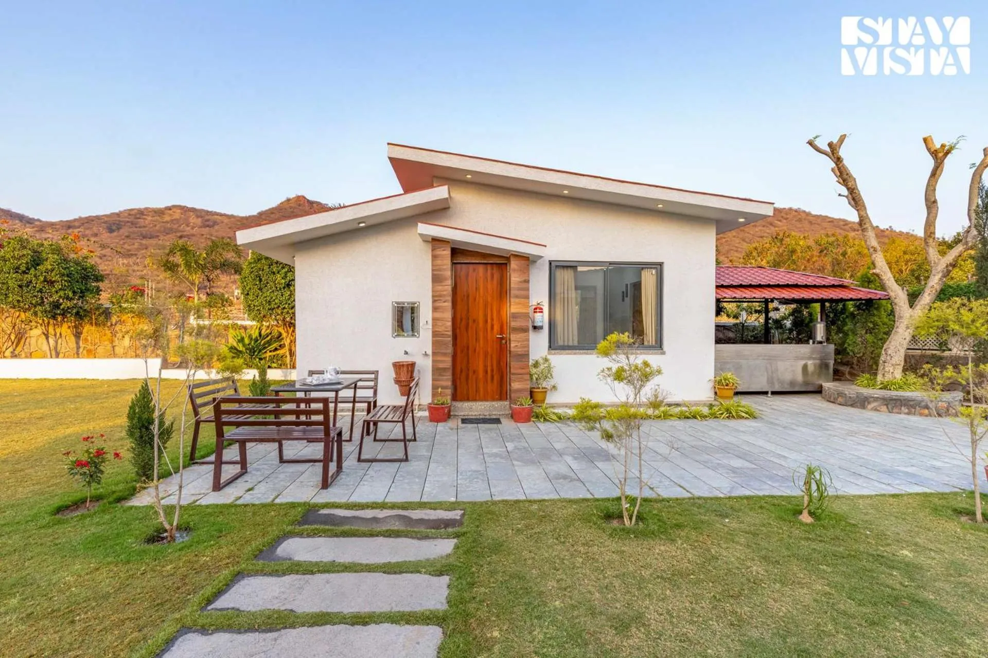 Facade/entrance in StayVista's Bella Dream - Mountain-View with Outdoor Pool, Lawn featuring a Gazebo & Indoor Games