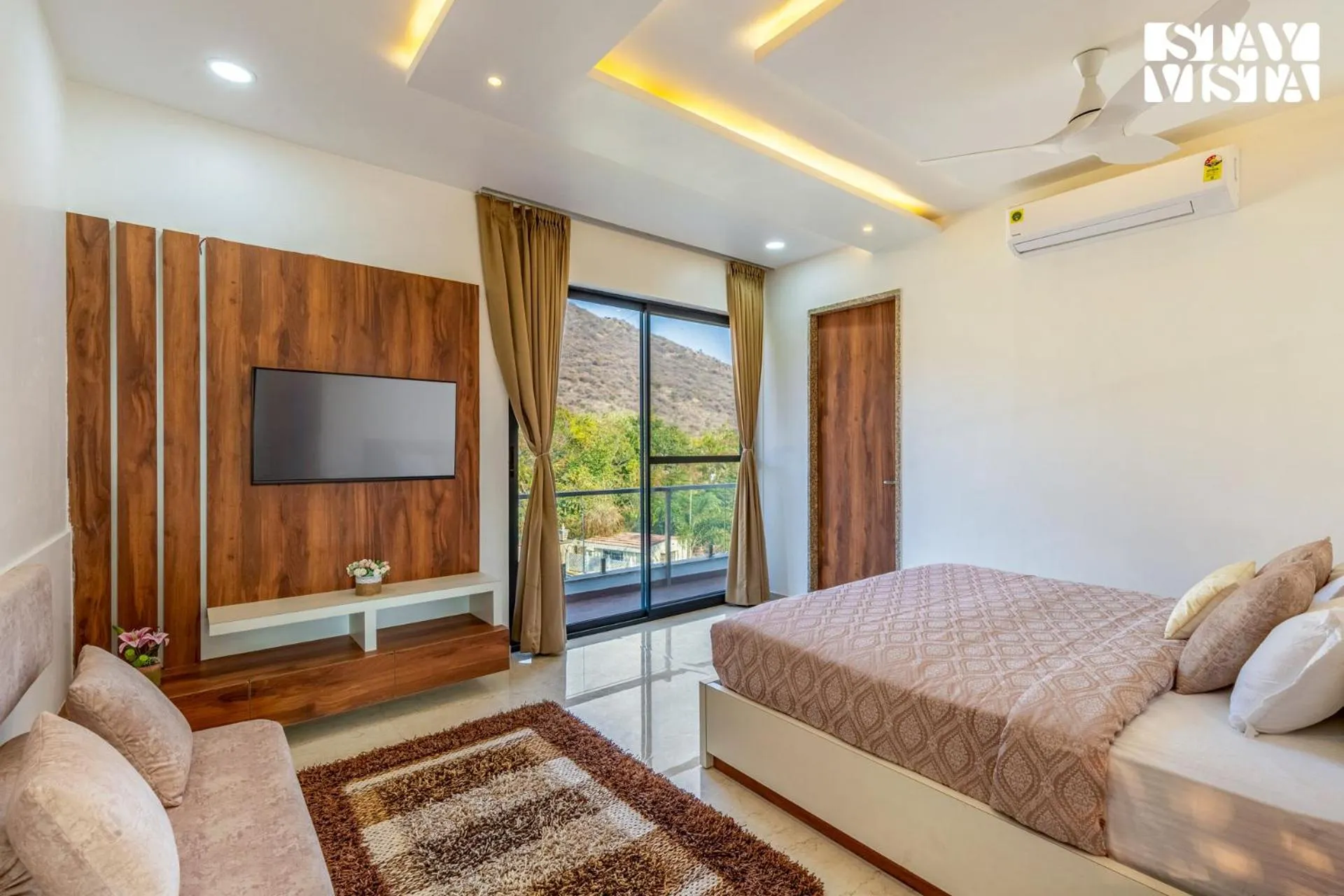 Bedroom, Bed in StayVista's Bella Dream - Mountain-View with Outdoor Pool, Lawn featuring a Gazebo & Indoor Games