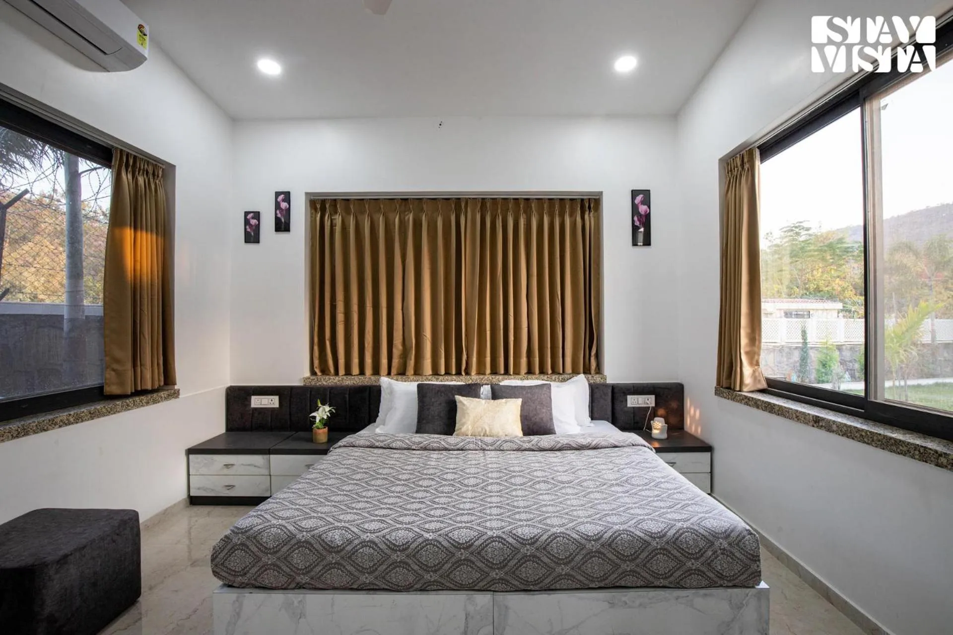 Bedroom, Bed in StayVista's Bella Dream - Mountain-View with Outdoor Pool, Lawn featuring a Gazebo & Indoor Games