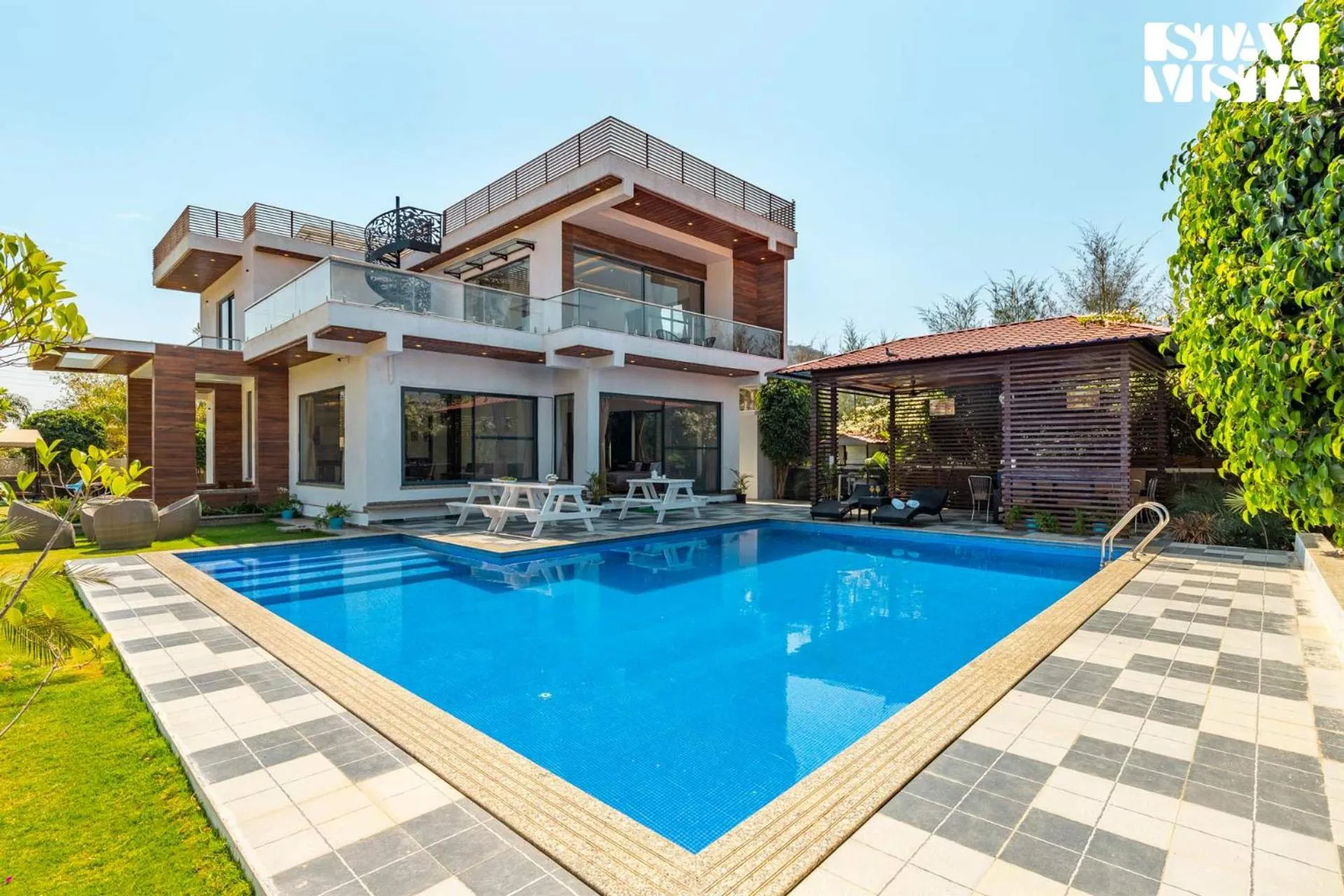 Swimming pool in StayVista's Bella Dream - Mountain-View with Outdoor Pool, Lawn featuring a Gazebo & Indoor Games