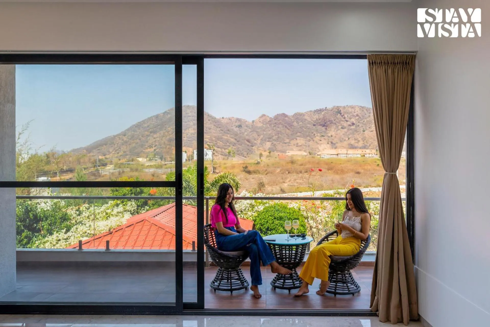 Balcony/Terrace in StayVista's Bella Dream - Mountain-View with Outdoor Pool, Lawn featuring a Gazebo & Indoor Games