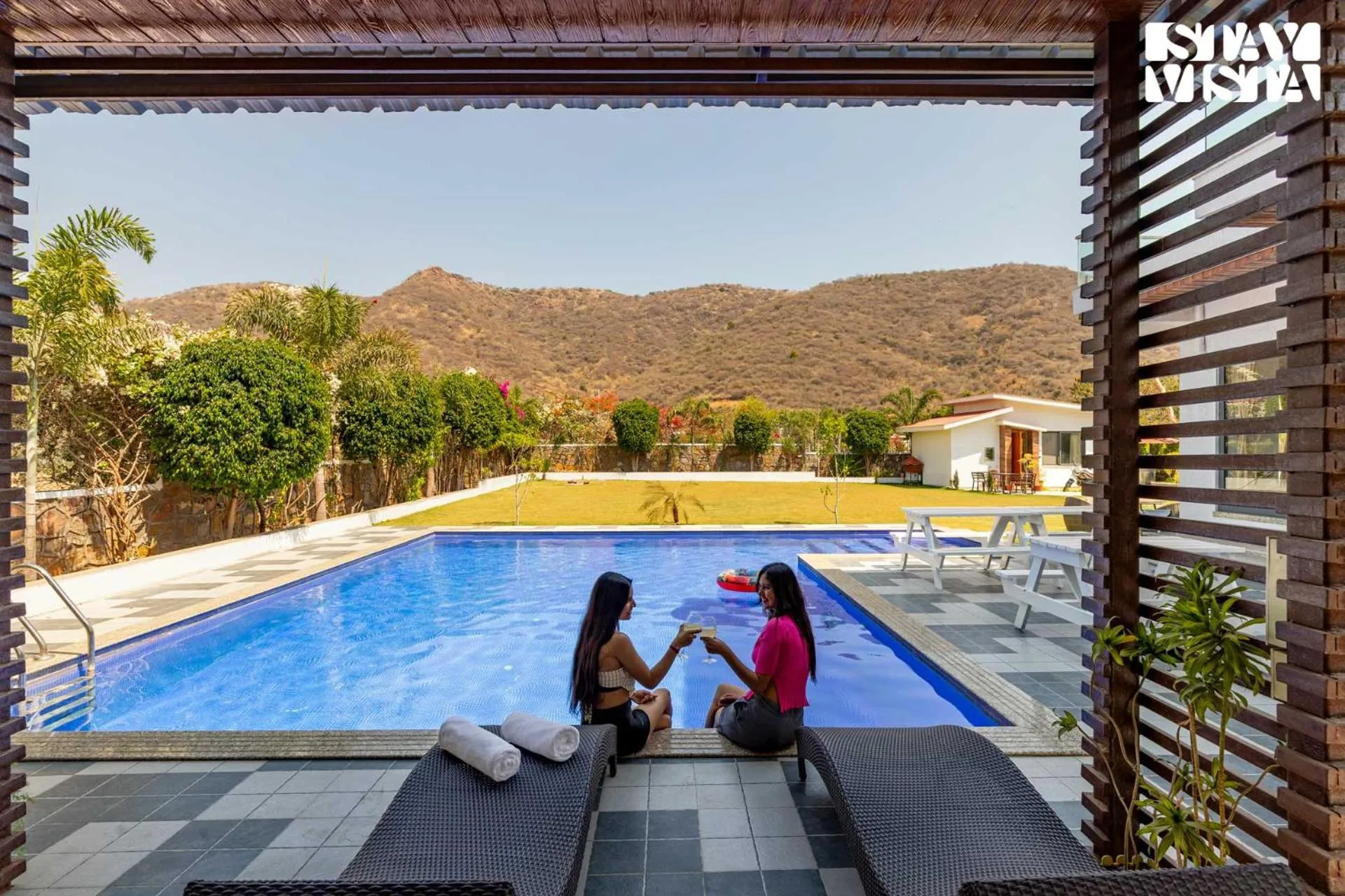 Swimming pool in StayVista's Bella Dream - Mountain-View with Outdoor Pool, Lawn featuring a Gazebo & Indoor Games