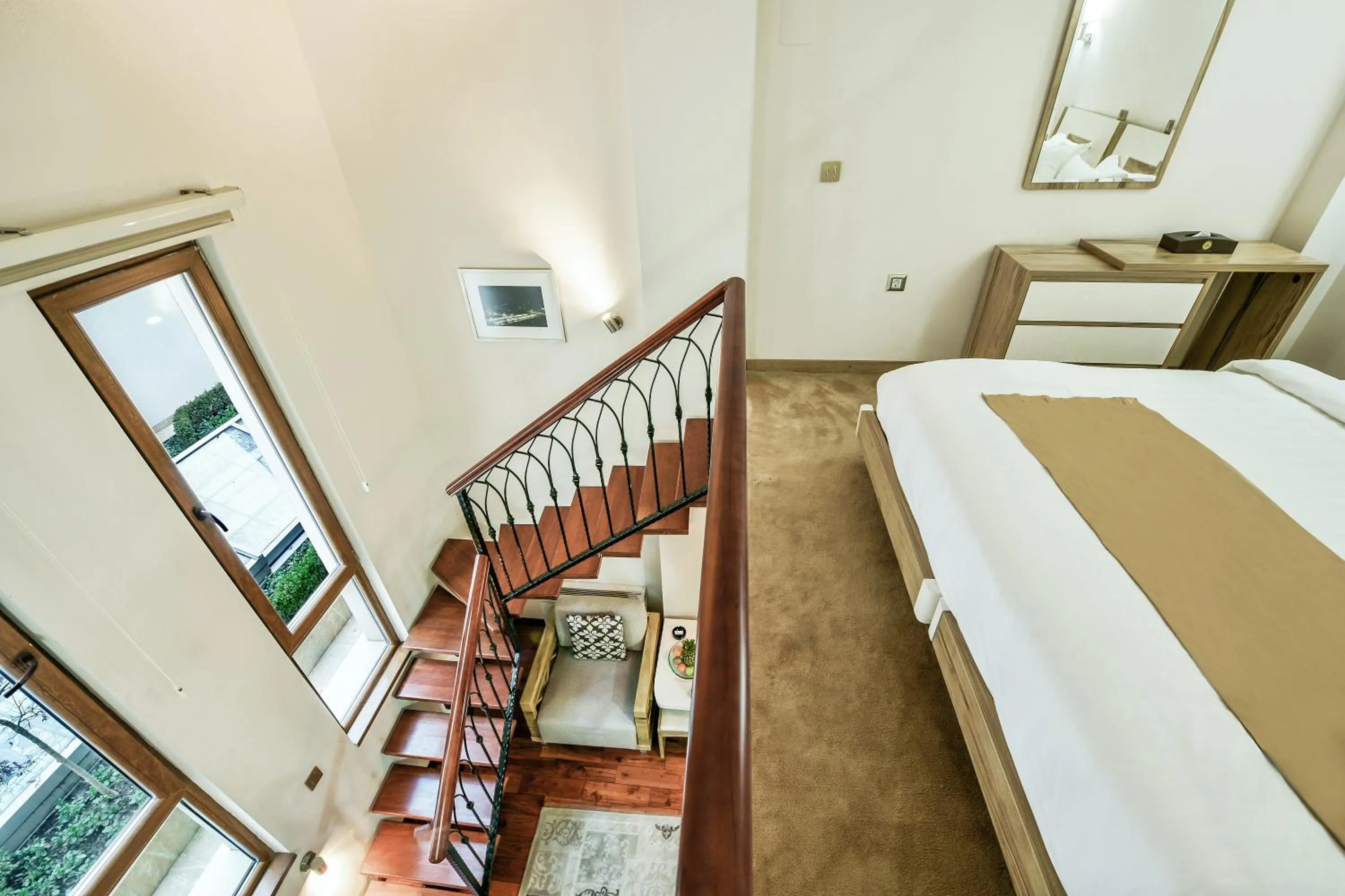 Seating area, Bed in Bushi Resort & SPA