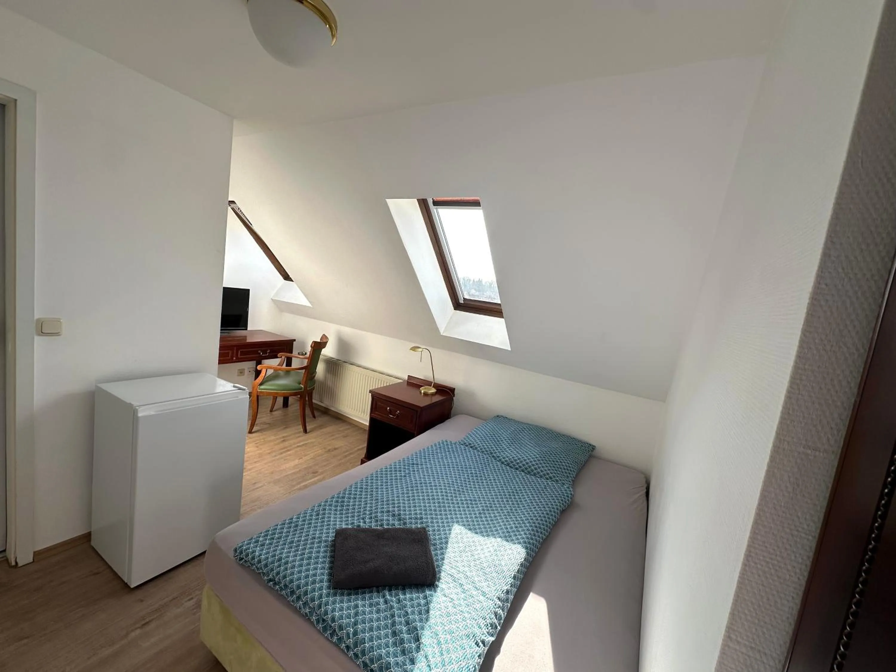 Bed in Gästehaus am Harz - Monteurzimmer mit Hotelstandard