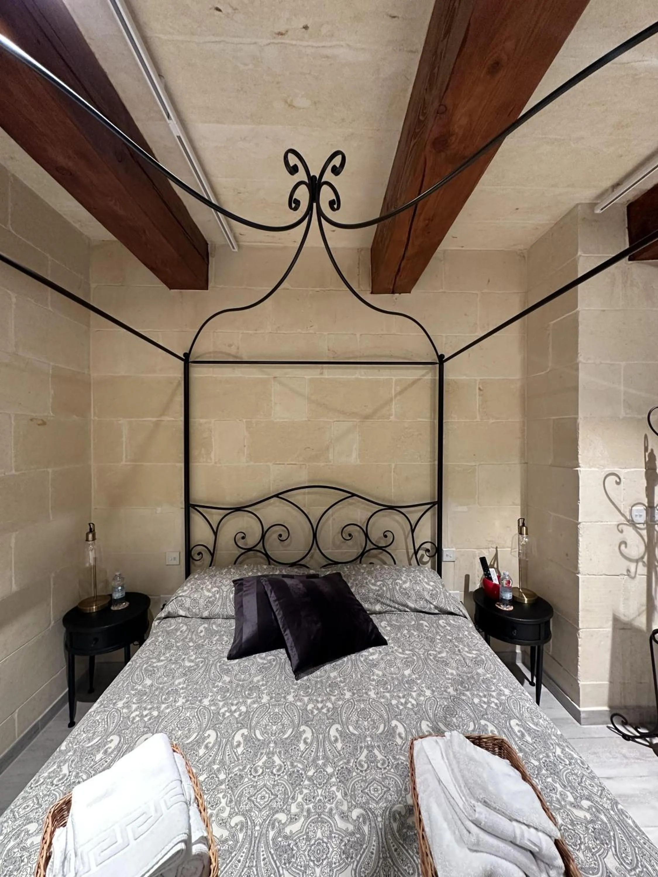 Bed in Ta' Pinu Spa Suite - Luxury Heritage Living