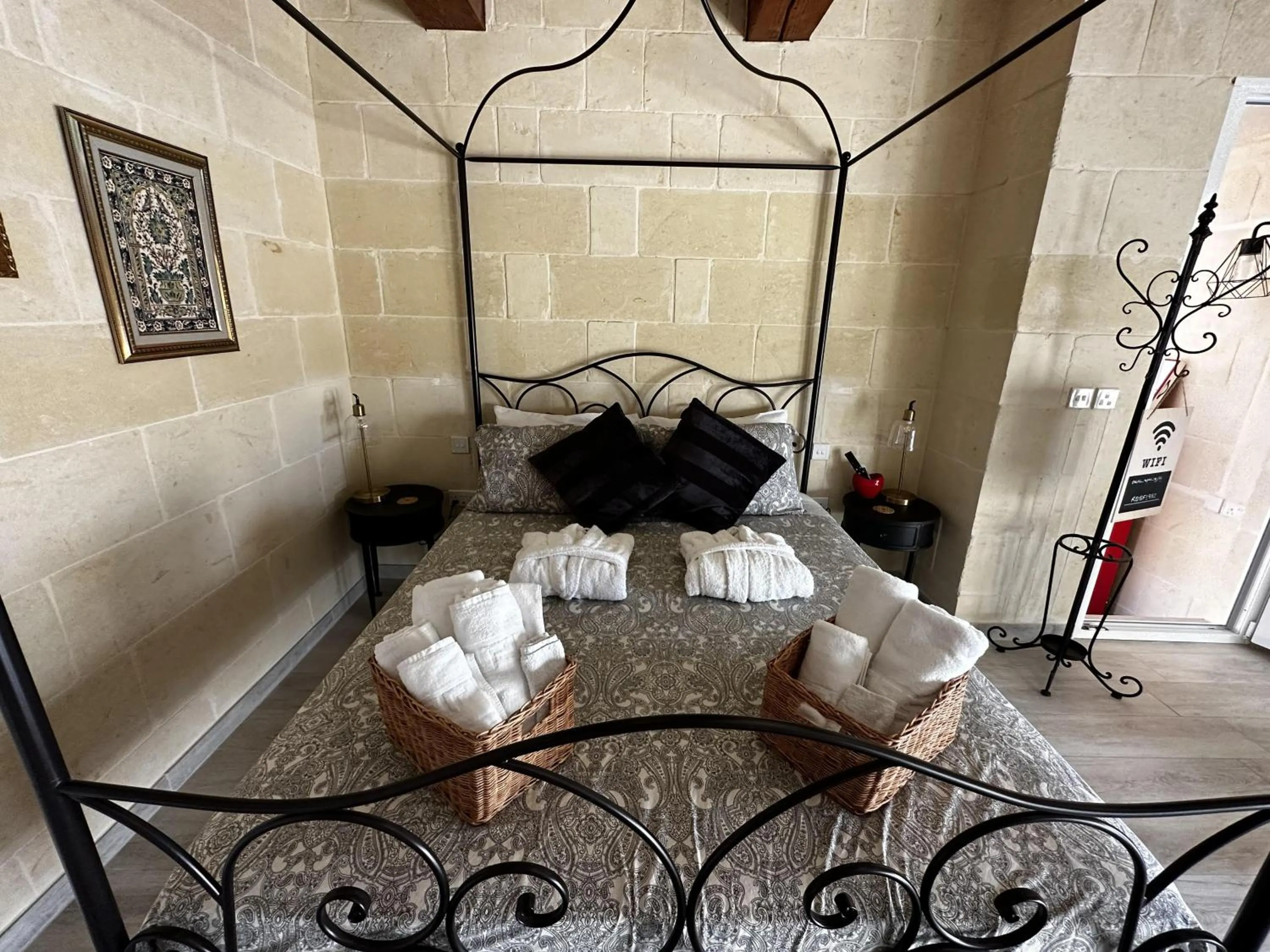 Bed in Ta' Pinu Spa Suite - Luxury Heritage Living