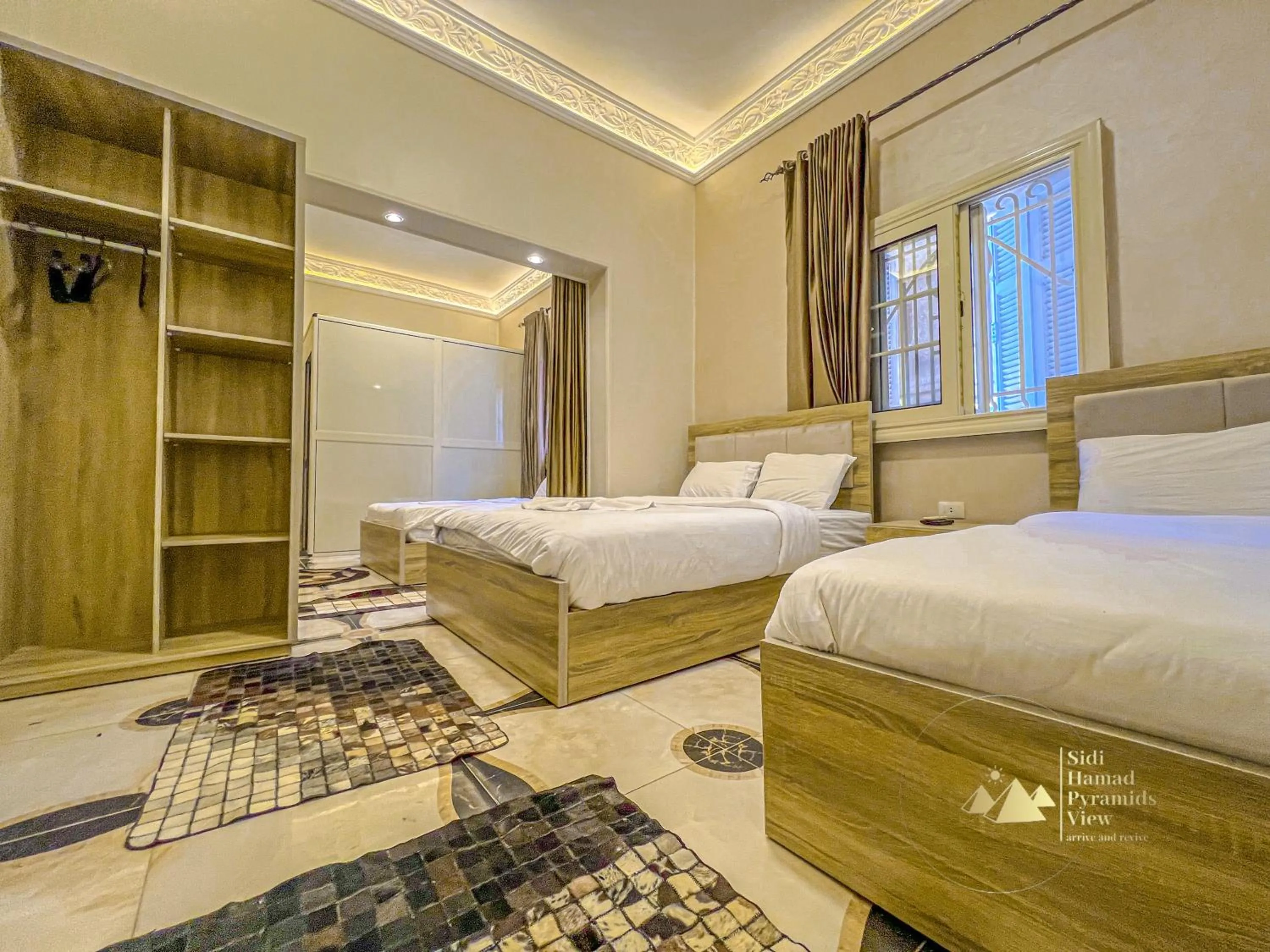 Photo of the whole room, Bed in Sidi Hamad Pyramids View