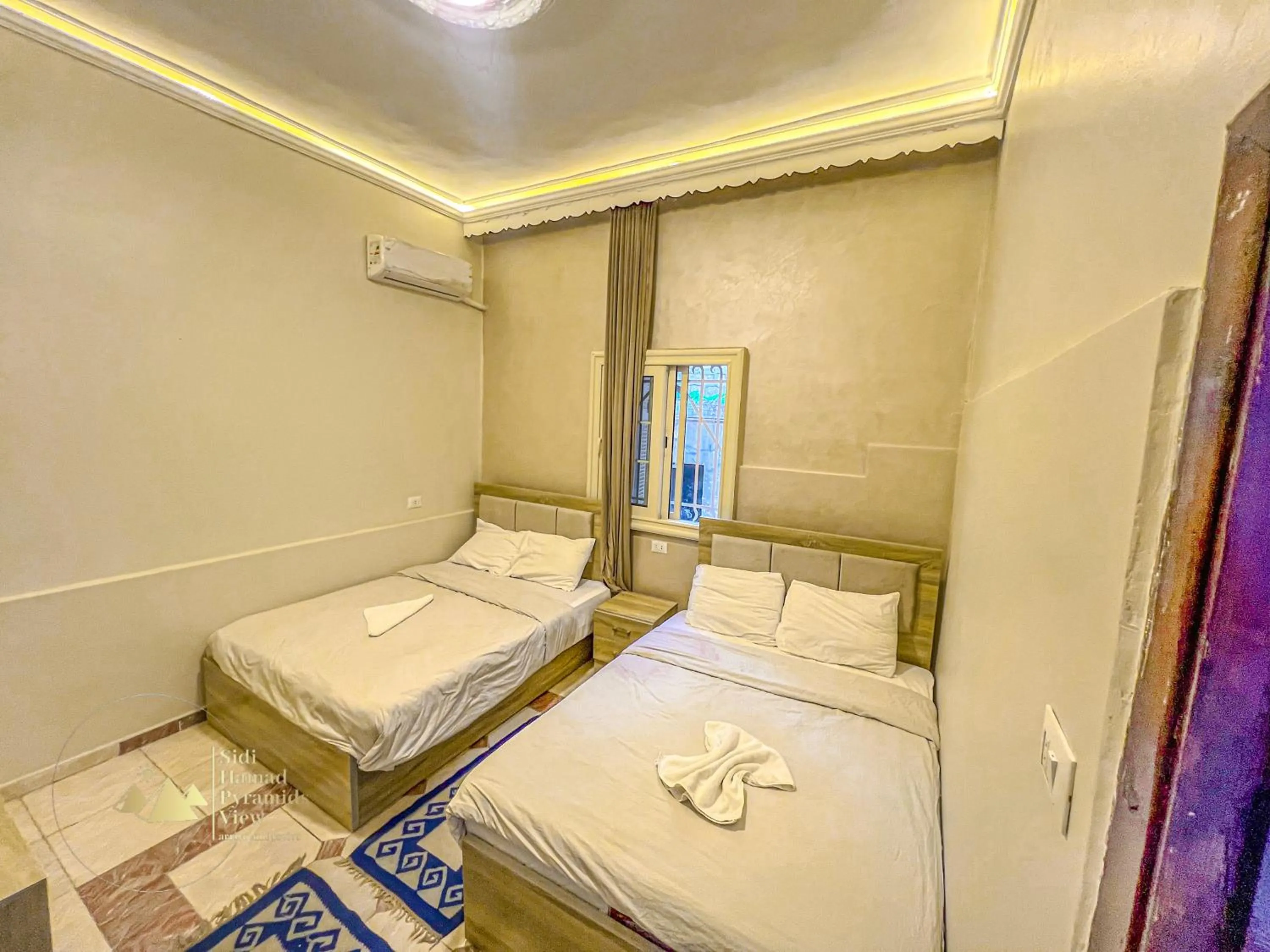 Photo of the whole room, Bed in Sidi Hamad Pyramids View