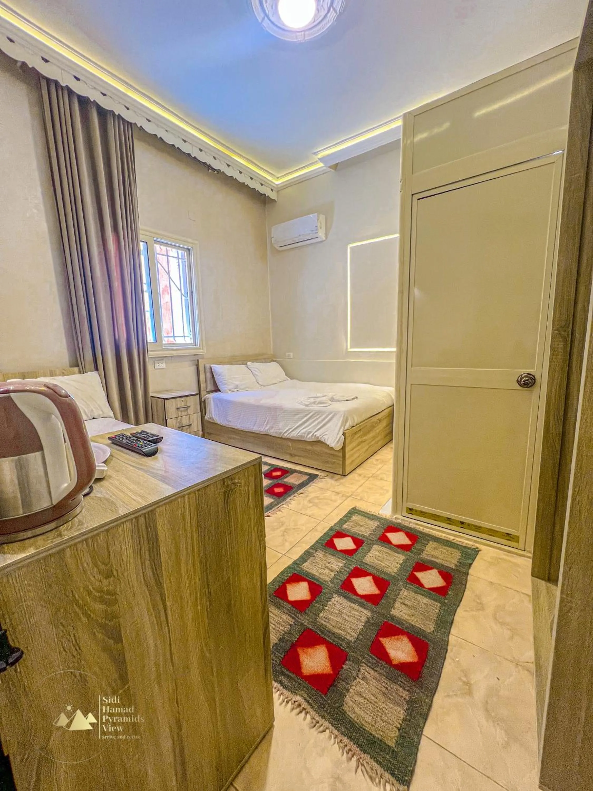 Photo of the whole room, Bed in Sidi Hamad Pyramids View