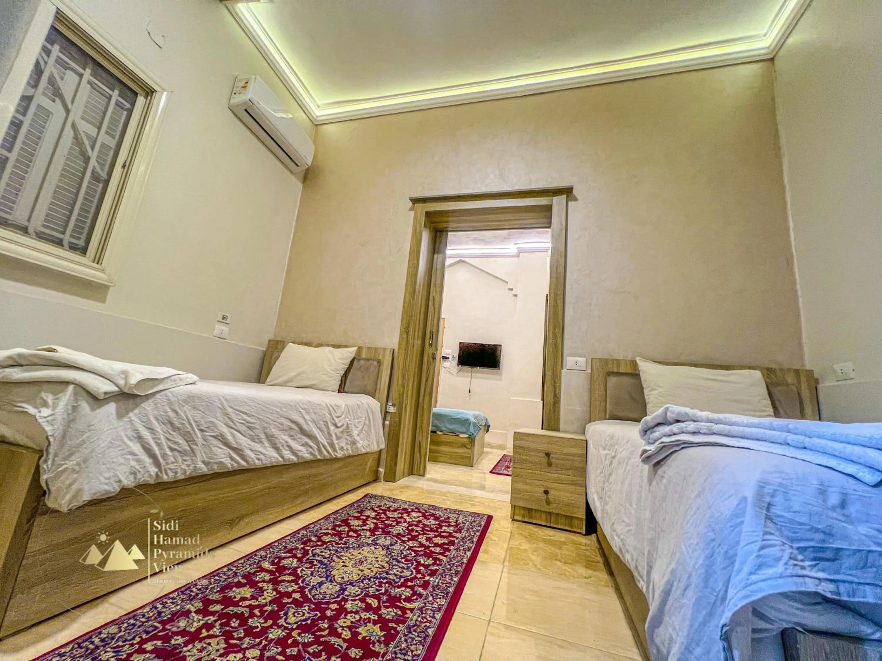 Photo of the whole room, Bed in Sidi Hamad Pyramids View