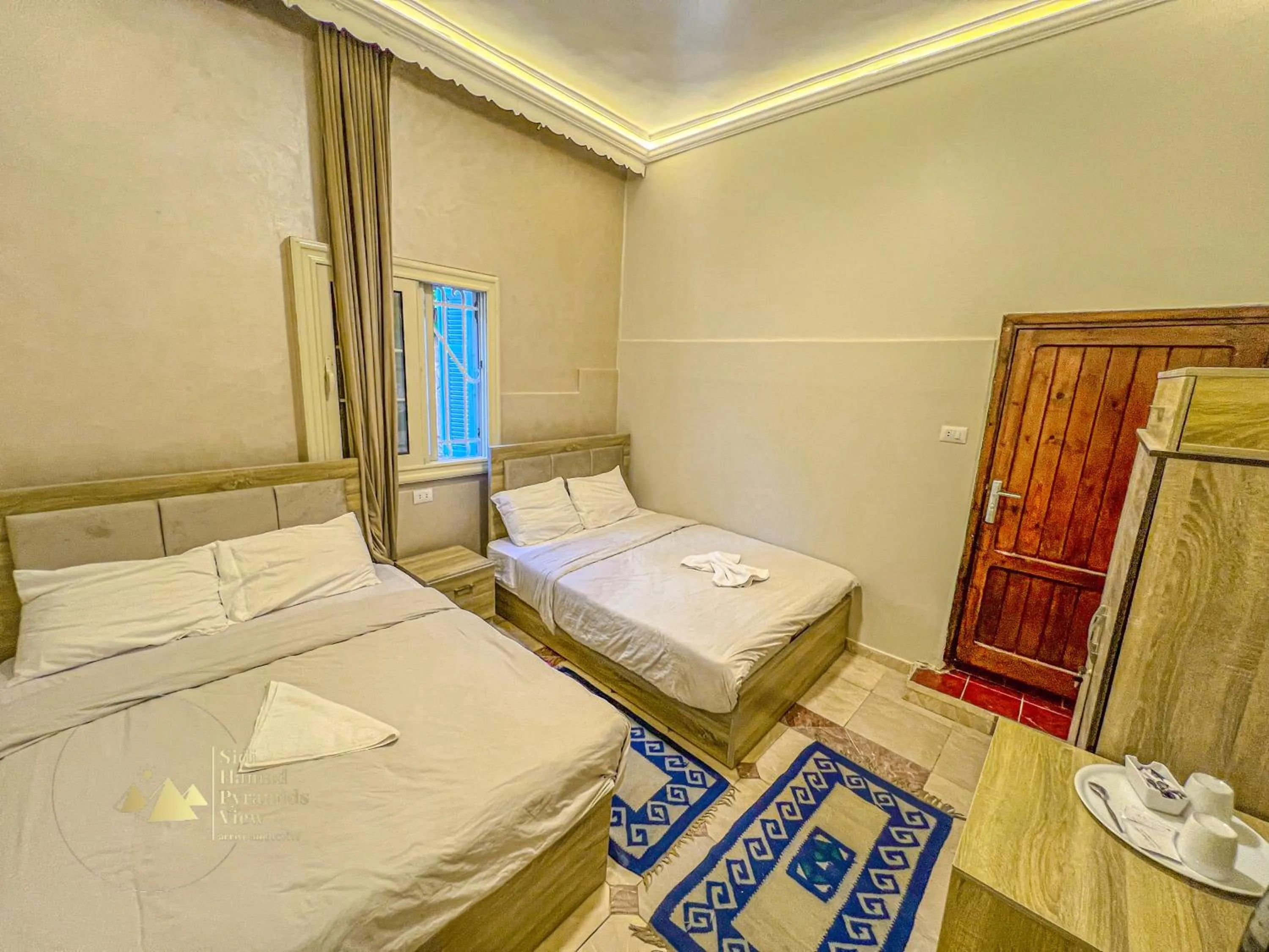 Photo of the whole room, Bed in Sidi Hamad Pyramids View