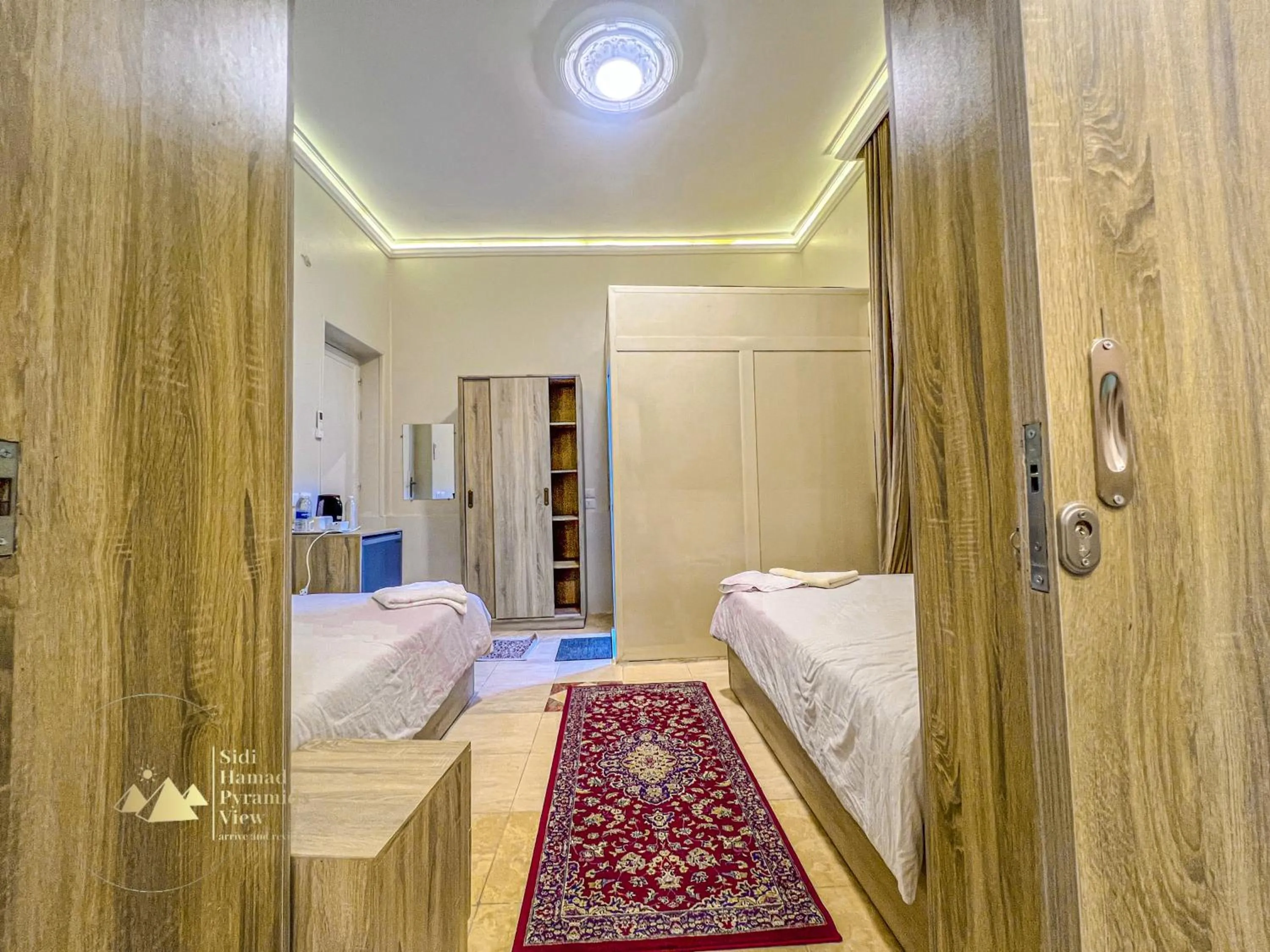 Photo of the whole room, Bed in Sidi Hamad Pyramids View