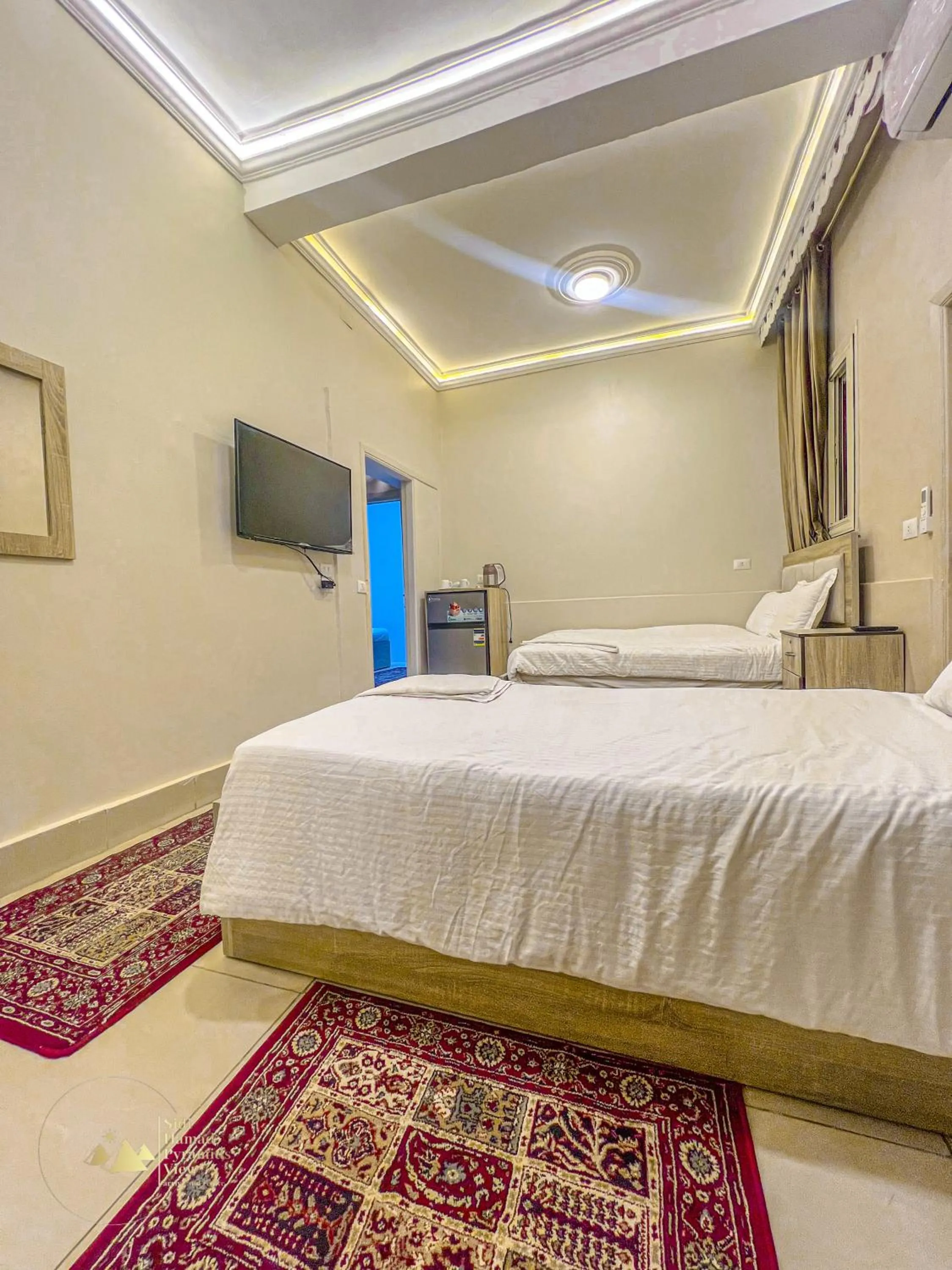Photo of the whole room, Bed in Sidi Hamad Pyramids View