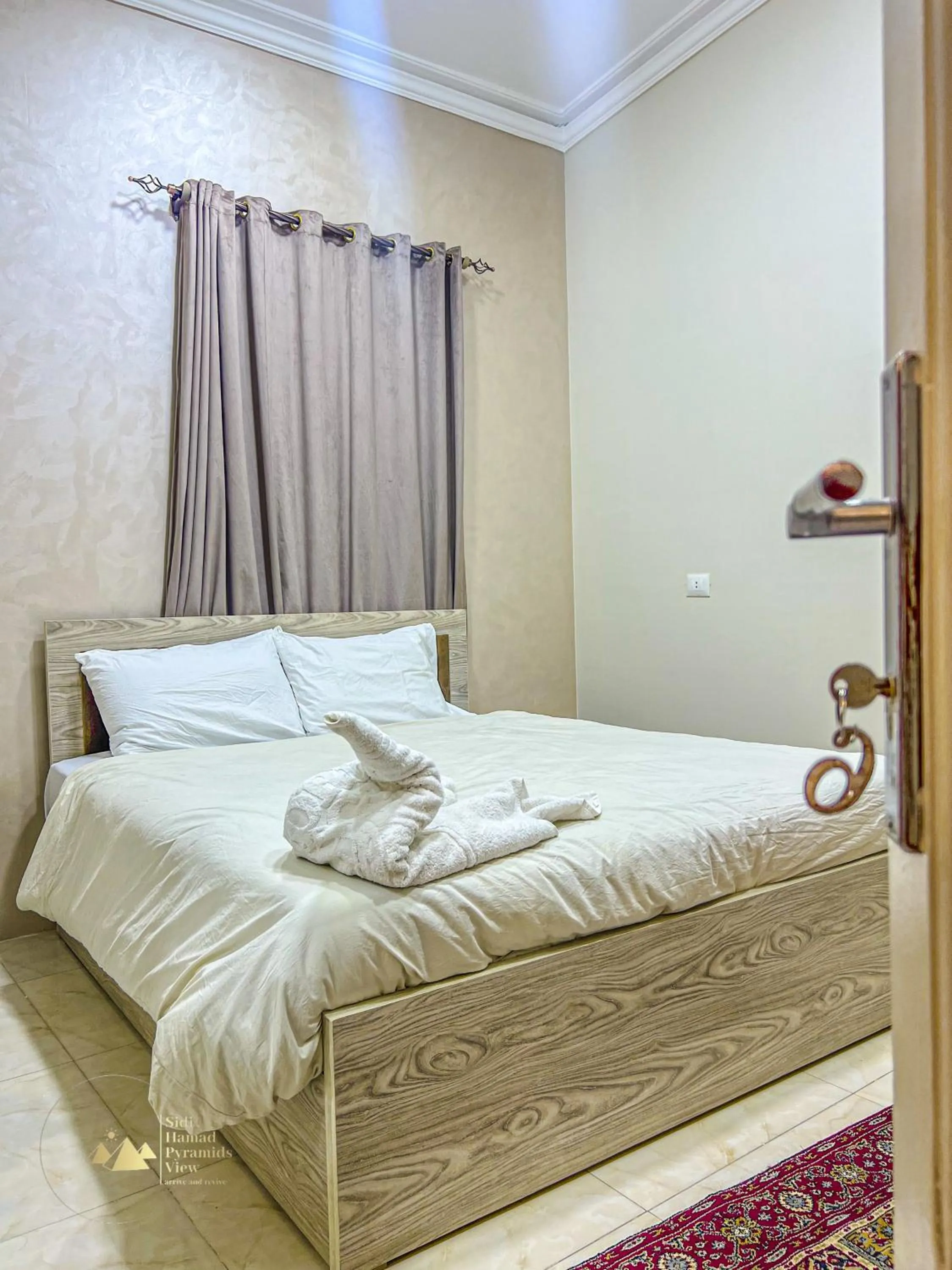 Photo of the whole room, Bed in Sidi Hamad Pyramids View