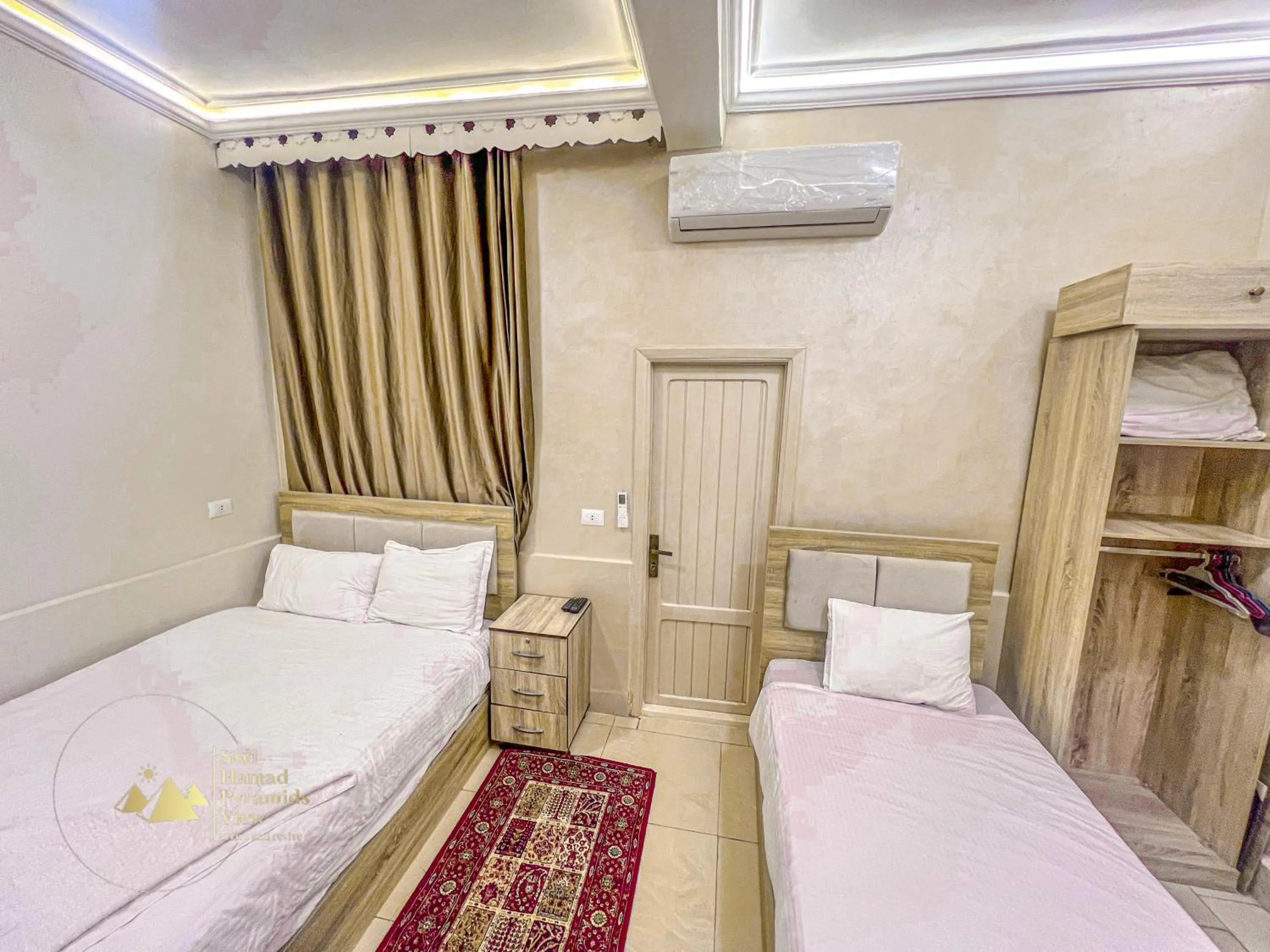 Photo of the whole room, Bed in Sidi Hamad Pyramids View