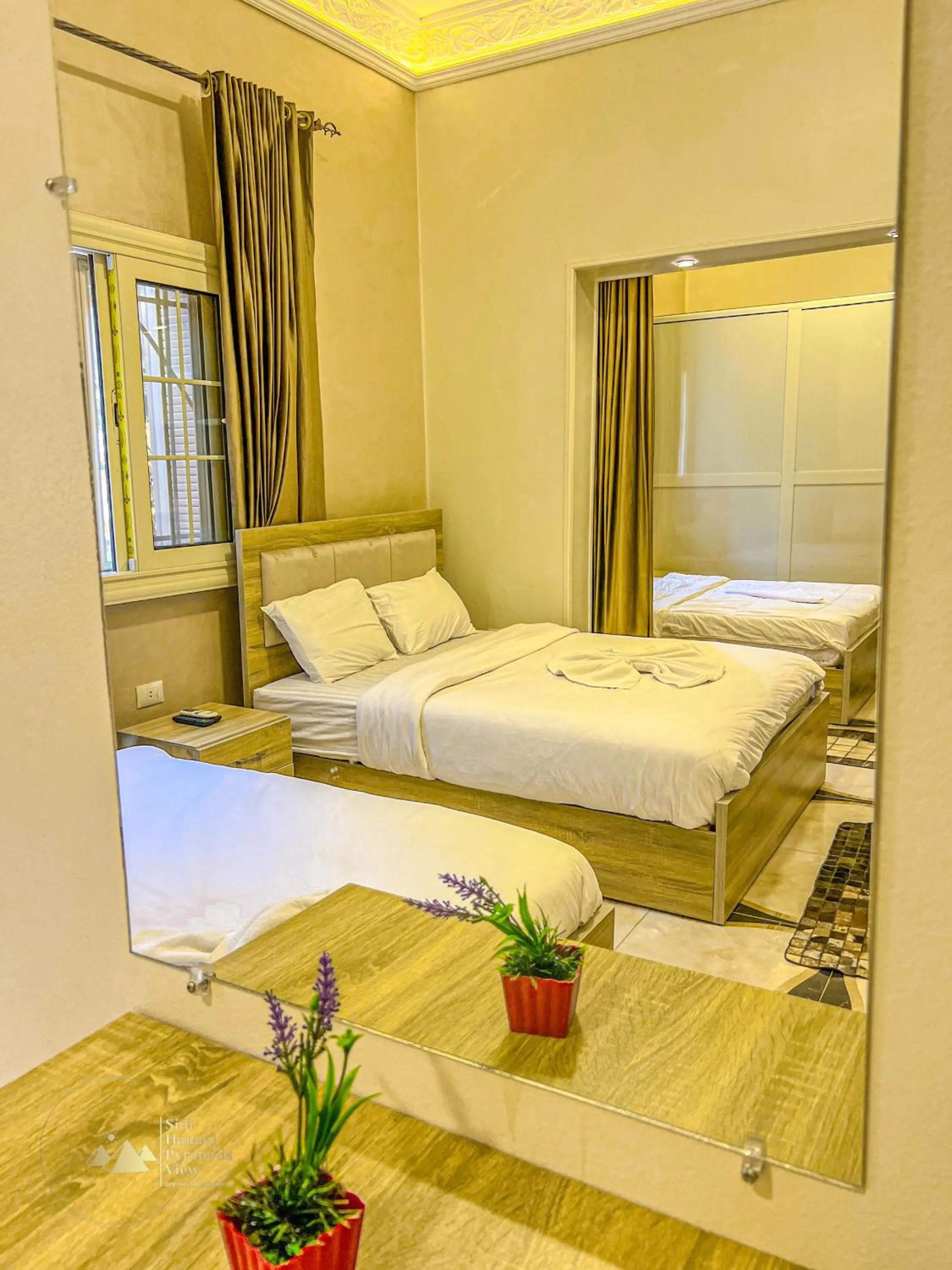 Photo of the whole room, Bed in Sidi Hamad Pyramids View